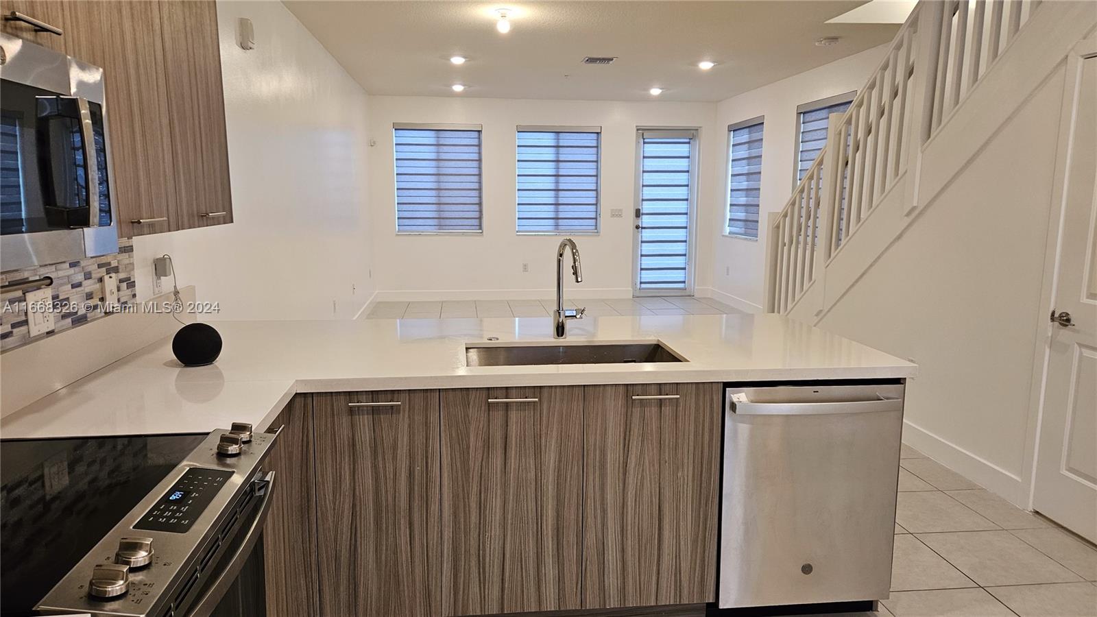 Welcome to a modern oasis at in vibrant Doral, FL. This stunning 3-bedroom, 2.5-bathroom townhouse spans 1,322 sq. ft., blending comfort and style. Inside, discover a spacious layout with natural light-filled living areas. The sleek kitchen suits culinary enthusiasts, while open-concept living and dining areas invite relaxation. The primary suite offers a serene retreat with an ensuite bath. Two additional bedrooms provide flexibility for guests or a home office. Year-round comfort is ensured with air conditioning. Enjoy tranquil lake views and community amenities like a state-of-the-art gym. Easy parking.
This home embodies modern living in a prime location and newly upgraded laminate wood on 2nd floor.
"1st month and a month deposit moves you in"
