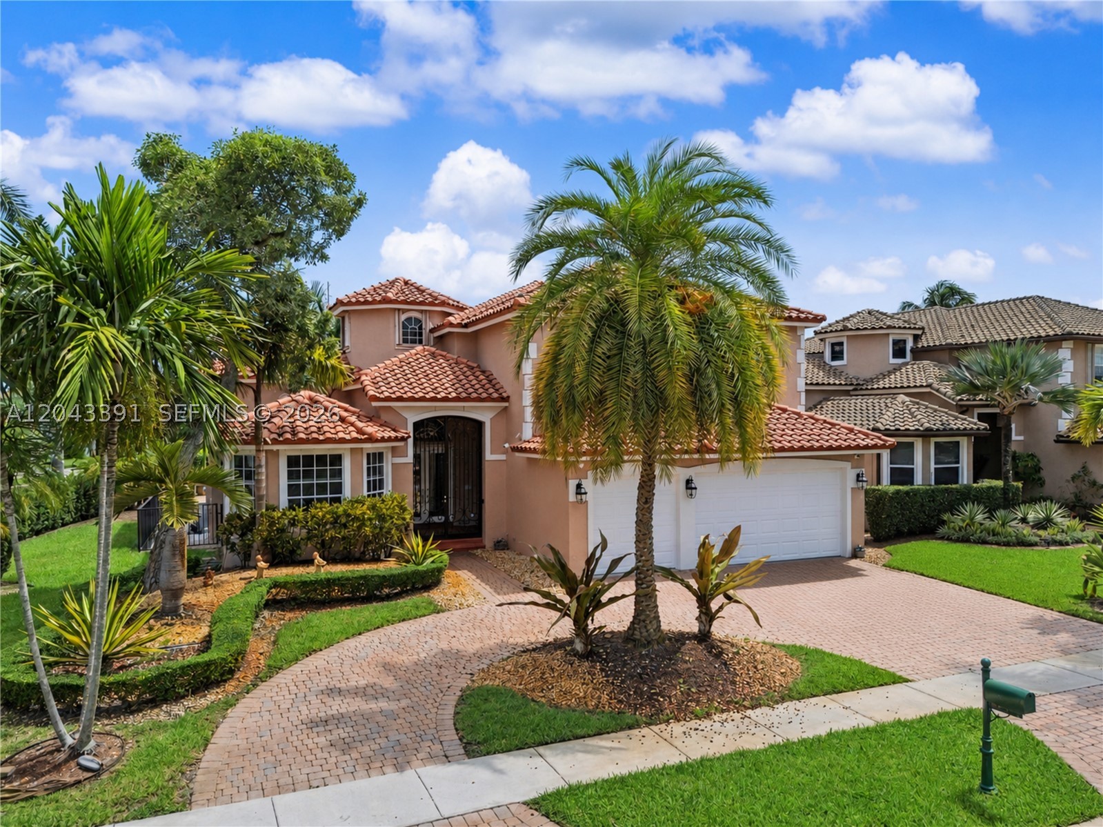 Stunning Two-Story Estate in Sunset Lakes. Corner-Lot Living at Its Finest!
Welcome to elevated living in one of Miramar's most coveted communities. This magnificent two-story residence commands a premium corner lot in the gated Sunset Lakes, offering 5 bedrooms, 4 full baths, and a 3-car garage designed for the way you want to live. Step inside to soaring vaulted ceilings and an open, light-filled layout finished to impress. The gourmet kitchen dazzles with rich granite countertops and state-of-the-art appliances, ready for everything from quiet mornings to unforgettable gatherings. a Brand new 2022 roof up top and impact windows and doors deliver peace of mind, energy efficiency, and a quiet, secure interior year-round. Retreat to a luxurious primary suite featuring his-and-her double walk-in closets and step out onto a huge private balcony, or an easily accessible bedroom in the ground floor with the same space and walk-in closet. Outdoors, entertaining reaches a new level with a fully equipped outdoor kitchen—your personal venue for weekend cookouts and evening celebrations under the South Florida sky. Space, style, security, and location come together in one exceptional package. Homes like this in Sunset Lakes don't last. Schedule your private showing today.