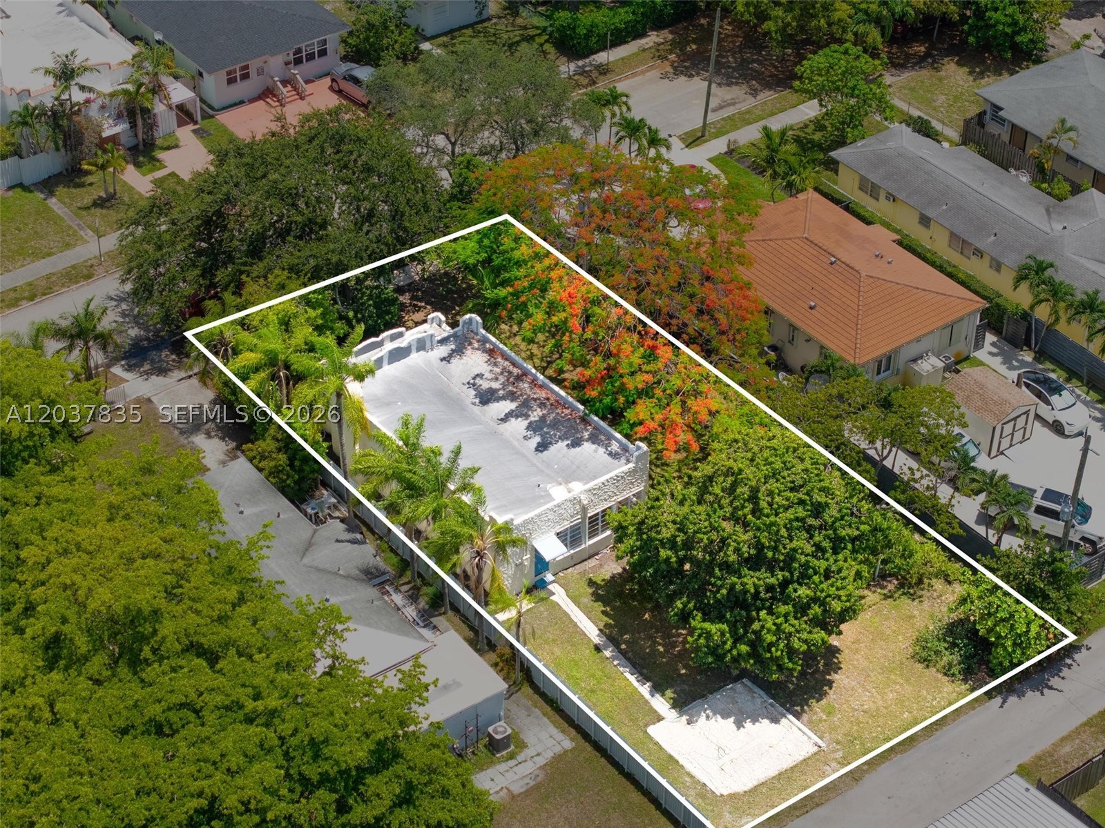 Charming home on a massive lot now available for immediate occupancy. Spacious living areas and bedrooms, plus two versatile flex spaces. Perfect for large families. Parking on the property and street. Enjoy a variety of fruit trees including mango, avocado, lychee and starfruit. For any questions about the property or to schedule a showing, call or text the listing agent.
