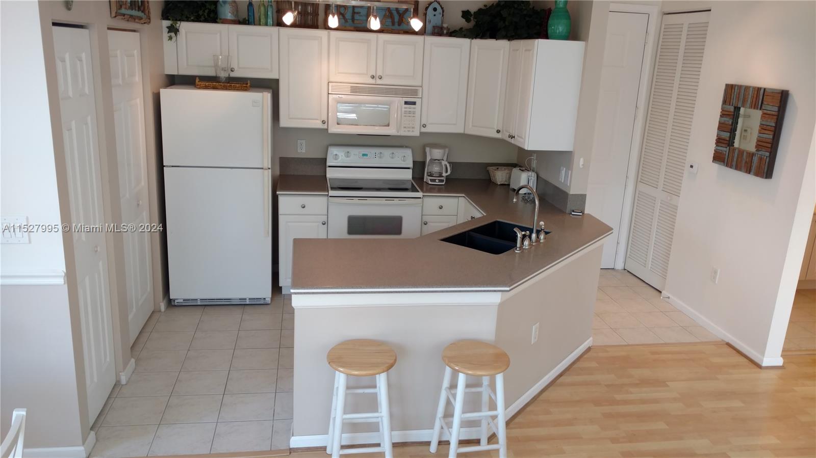 EL-AD VILLAGGIO CONDO - Residential Lease