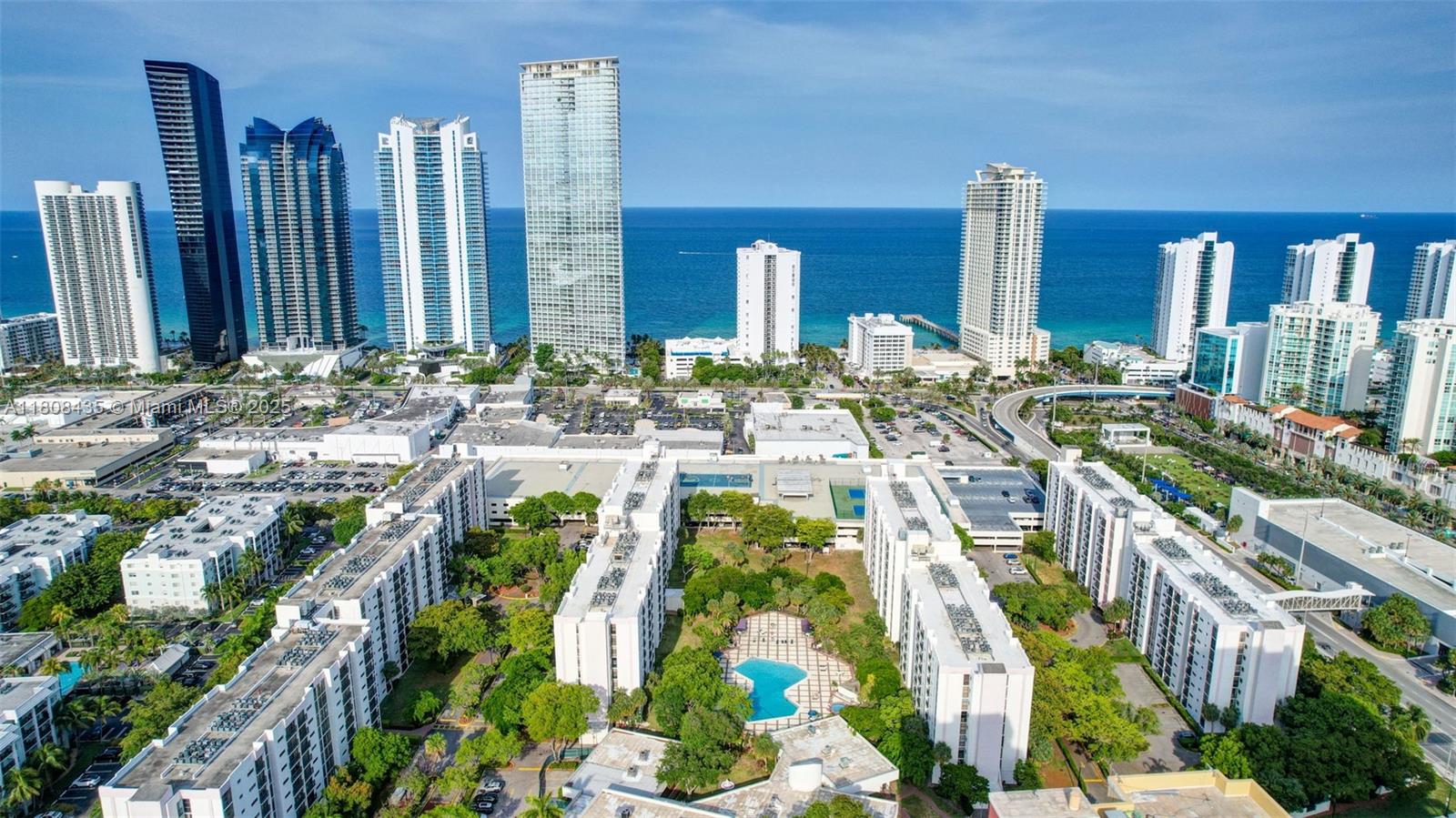 Spacious 2BR/2BA condo in Plaza of the Americas, located near the beach and Aventura Mall. Gated community with 24/7 security, heated pool, jacuzzi, tennis and basketball courts, gym, sauna, BBQ areas, party room, jogging path, covered and guest parking, laundry on each floor, and community shuttle. Functional layout with natural light and a private balcony. Conveniently close to shopping, dining, grocery stores, parks, playgrounds, houses of worship, and major highways. Located near A-rated schools. Centrally positioned between Miami and Fort Lauderdale and near two major airports, offering unmatched access to everything South Florida has to offer. Perfect for full-time living, seasonal use, or investment in a prime location.