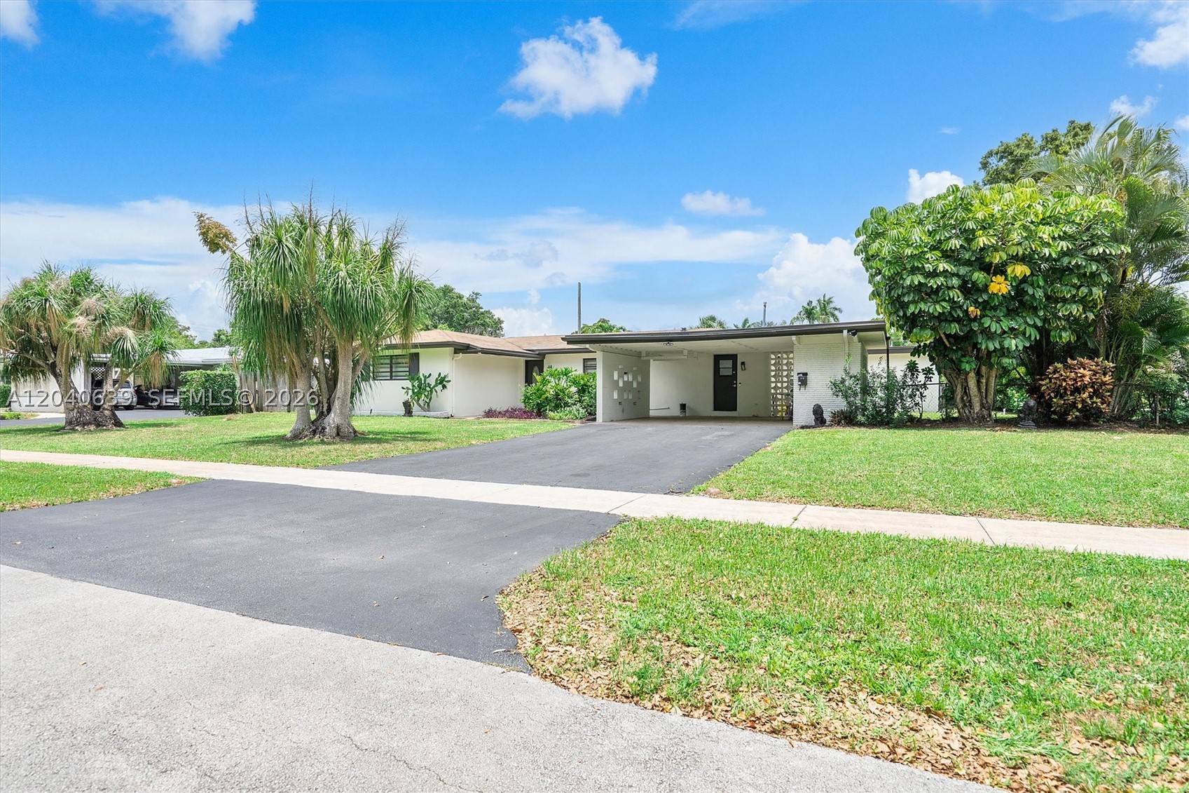 The largest home for the price in the neighborhood—nearly 2,500 sqft of beautifully remodeled living space! This
modern stunner features TWO ensuite bedrooms, including a private-entry suite, double
vanity bathroom, and serene pool views—perfect for in-laws or rental income. The open kitchen impresses with a
large peninsula, stainless steel appliances, and a walk-in pantry. Enjoy luxury vinyl flooring, walk-in closets,
recessed lighting, and an office that can flex into a sleek bar. The fully fenced backyard oasis boasts an in-ground
pool, charming paver walkways, water fountain, and pergola. This home offers unmatched space, style, and
versatility—don’t miss it!