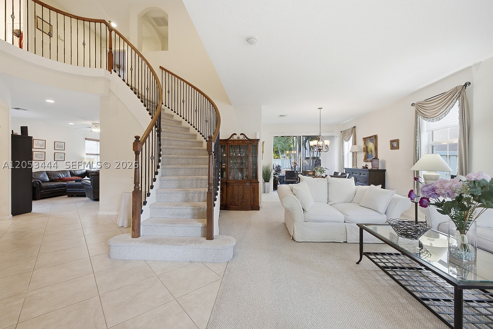 Welcome to this beautifully maintained Vizcaya model in the prestigious gated community of Riviera Isles! Offering an exceptional floor plan, this home combines space, comfort, and functionality for today's lifestyle.
One of its most unique features is the expanded primary suite, customized by the builder at the owner's request to create an oversized retreat with a spacious sitting area—ideal for a home office, media room, nursery, fitness space, or private lounge. Primary bath has a spa tub. Originally designed by the builder as a 5-bedroom home, the expanded primary suite can be converted back to a fifth bedroom if desired. The home features an upgraded kitchen, new A/C system, whole-house water filtration system, elegant wood staircase with upgraded railing, and an extended patio perfect for entertaining or relaxing outdoors. The roof has been meticulously maintained, and the second floor is equipped with hurricane shutters for added peace of mind.
Located in one of Miramar's most sought-after communities, Riviera Isles offers resort-style amenities including a clubhouse, fitness center, swimming pool, tennis courts, playgrounds, scenic walking paths, and beautifully landscaped common areas.Conveniently situated near top-rated schools, parks, shopping, dining, and major highways, this move-in-ready home offers the perfect blend of luxury, comfort, and location.