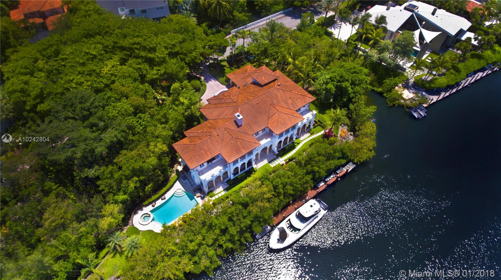 *OWNER FINANCING*Welcome to Paradise with water on 2 sides of Coral Gables Wtrway.Cocoplum home design by Ramon Pacheco and it's 75 ft.Egant 6bdrm 6.5bth simply has it all; marble floors & hard wood in the bdrms.  Movie theater, elevator, summer kitchen, high coffered ceilings, waterfront pool, 3 car garage, 60kw backup Generator and 350 gal.Diesel tank, video security system, staff qrtrs, high end impact Wndws & drs, huge kitchen w/plenty of hardwood cabinetry and the best appliances money can buy.
