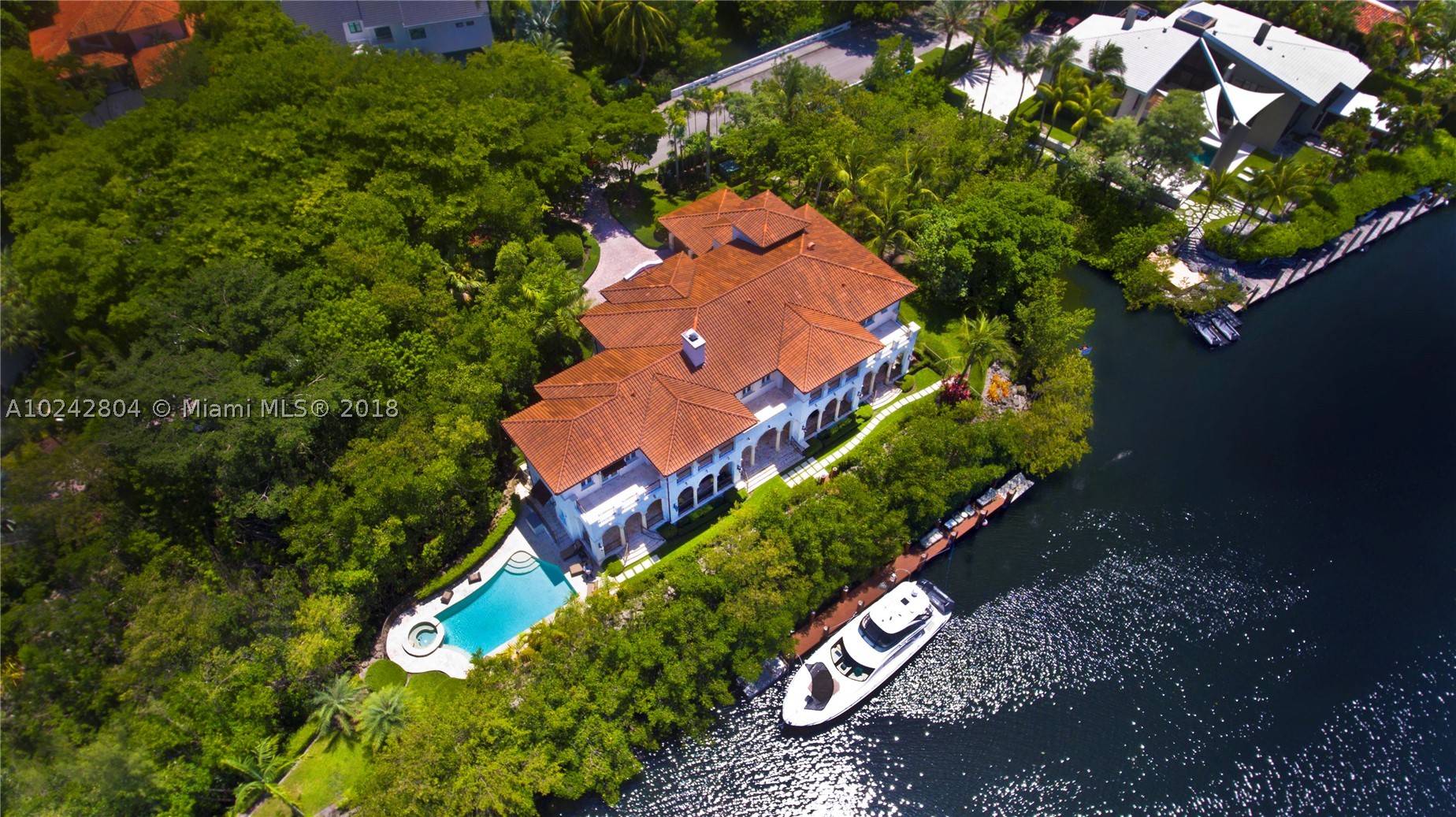 *OWNER FINANCING*Welcome to Paradise with water on 2 sides of Coral Gables Wtrway.Cocoplum home design by Ramon Pacheco and it's 75 ft.Egant 6bdrm 6.5bth simply has it all; marble floors & hard wood in the bdrms.  Movie theater, elevator, summer kitchen, high coffered ceilings, waterfront pool, 3 car garage, 60kw backup Generator and 350 gal.Diesel tank, video security system, staff qrtrs, high end impact Wndws & drs, huge kitchen w/plenty of hardwood cabinetry and the best appliances money can buy.