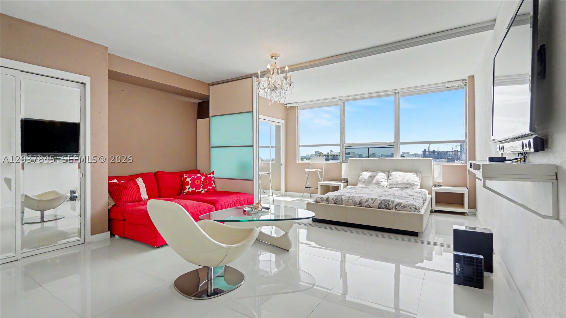 Best Studio Deal at Flamingo South Beach! This stylish residence features tile floors throughout, sliding partition panels for added privacy, and a W/D in the unit. Enjoy open east views of the city skyline and the Atlantic Ocean. The building offers over-the-top full amenities. Located in the heart of South Beach, walk to restaurants, shopping, nightlife, and the beach. Experience the ultimate South Beach lifestyle and live in the center of it all!