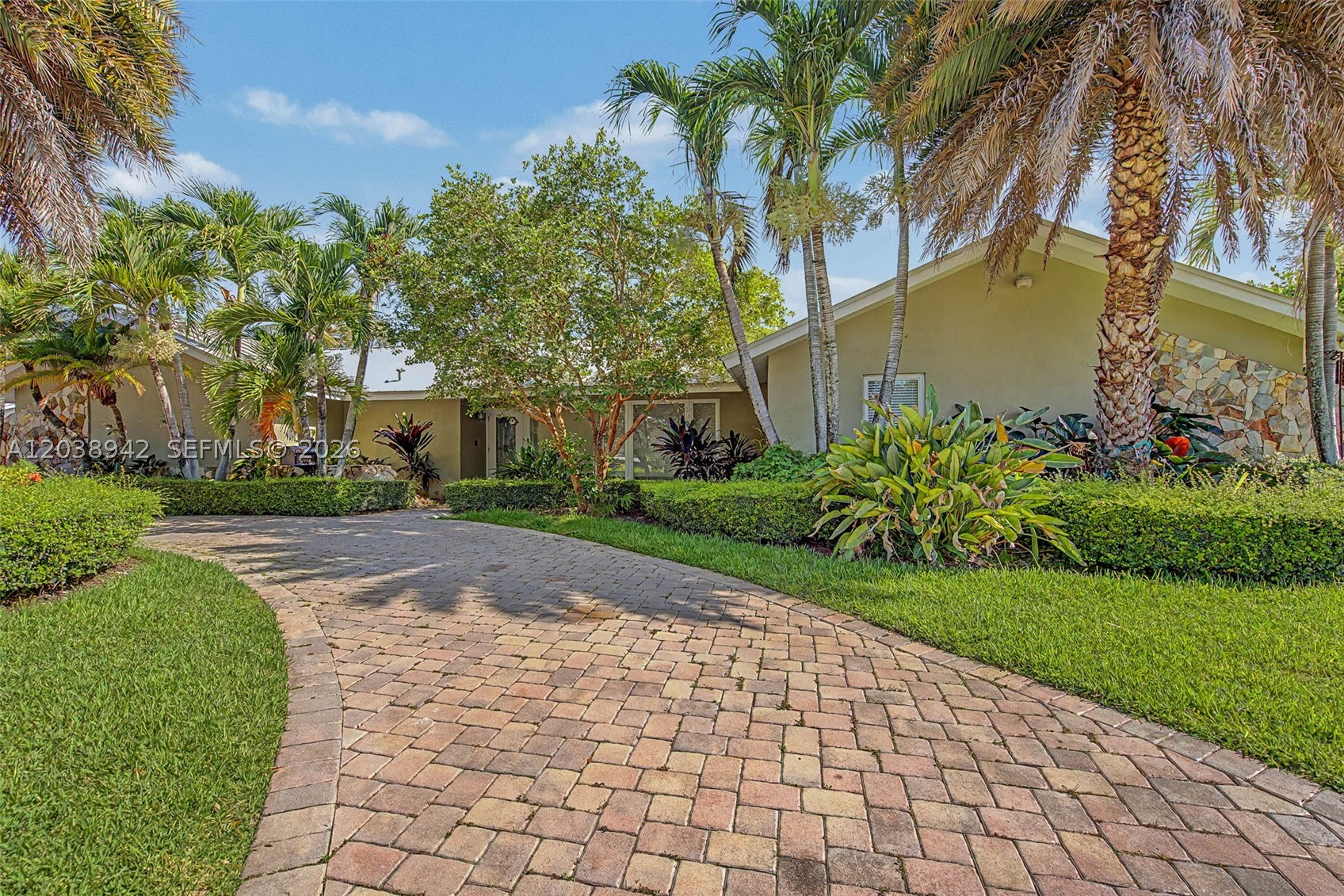 Embrace true South Florida Living in this wonderful 4 bdrm/3.5 bath home in the heart of Palmetto Bay! Formal living & dining rms w/ vaulted ceilings. Inviting kitchen has center island, pantry, opens to spacious family rm w/ half bath & french doors overlooking the tropically landscaped backyard. Well-allocated guest bdrms & remodeled guest baths. Fabulous primary suite w/ large bath complete w/ dual sinks, separate shower, soaking tub, walk in closet & access to private lanai w/ hot tub. 2021 metal roof, impact windows/doors, porcelain tile throughout. Indoor laundry rm. Fenced backyard w/ partially covered marble tile patio, heated pool, shed, raised garden bed & mango & lychee trees. Double gated side yard w/ space to park your boat. 2 car side entry garage & circular paver driveway.