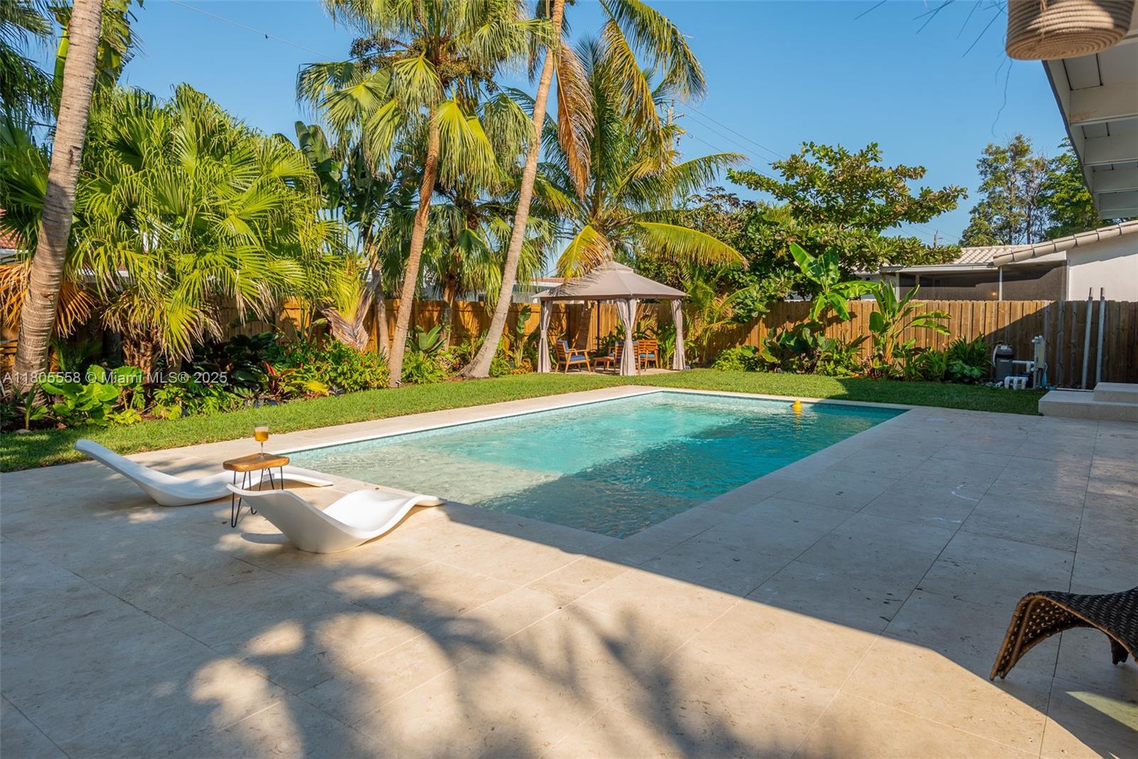 Great opportunity to own or invest in a short term approved area in Hollywood! Charming home in Hollywood Lakes on Washington Street, nestled on a rare double lot (9200 square feet) with a lush, beautifully landscaped garden. Featuring a brand-new swimming pool and a thoughtfully renovated interior, this 3-bedroom, 2-bathroom home boasts a seamless flow between the living, dining, and kitchen areas. Located in a safe and picturesque neighborhood near parks, beaches, and downtown Hollywood, it’s ideal for a family home or a lucrative Airbnb investment. The spacious double lot offers plenty of privacy and room for entertaining, while modern upgrades and timeless design ensure comfort and style. Don’t miss this rare opportunity to own a versatile property in one of Hollywood’s most desirable areas. Call listing agent now for showing.