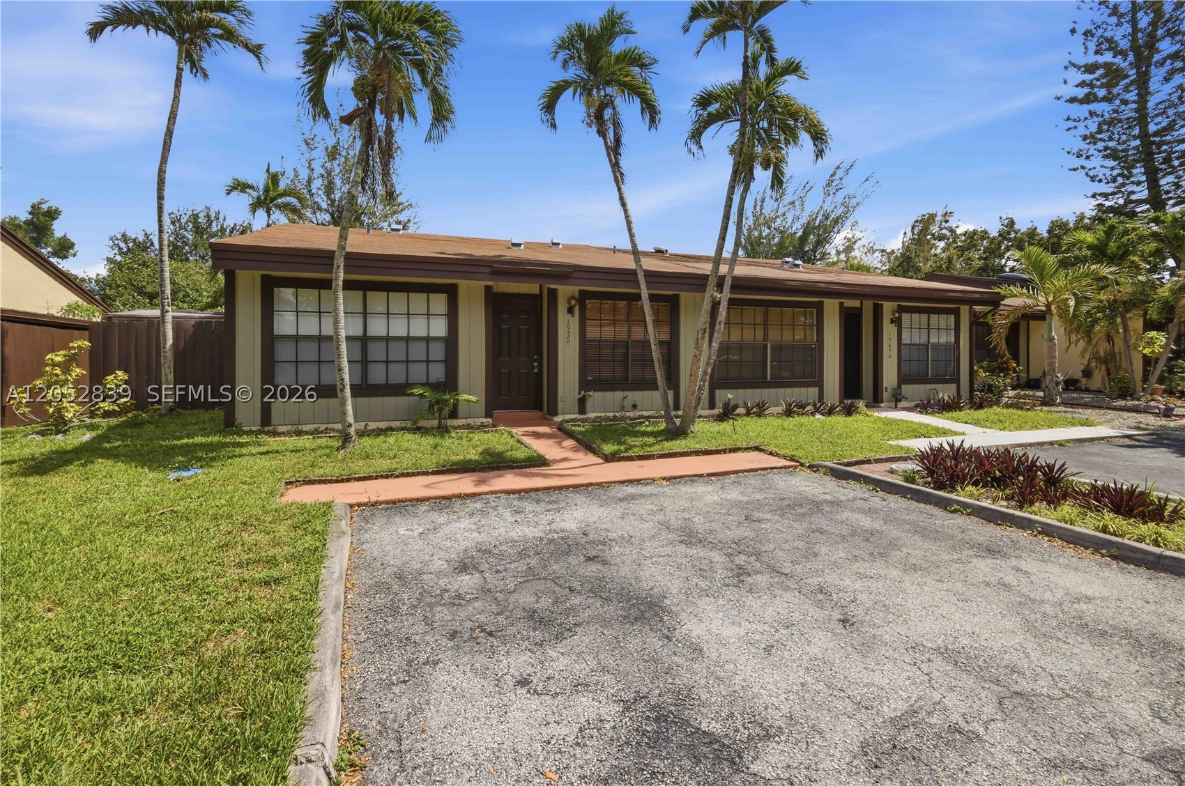 Lakefront 2-bedroom, 2-bath corner-unit townhome in the desirable Cedarwoods community of Pembroke Pines. Enjoy one of the best lake views in the neighborhood from the private concrete patio, with sliding glass doors from both the living room and primary bedroom. This home features vaulted wood ceilings, large walk-in closets, and plenty of natural light. Pet-friendly, all-ages community with scenic walking paths along the lake. Conveniently located just minutes from Pembroke Lakes Mall, C.B. Smith Park, shopping, dining, schools, and major highways including I-75 and the Florida Turnpike.