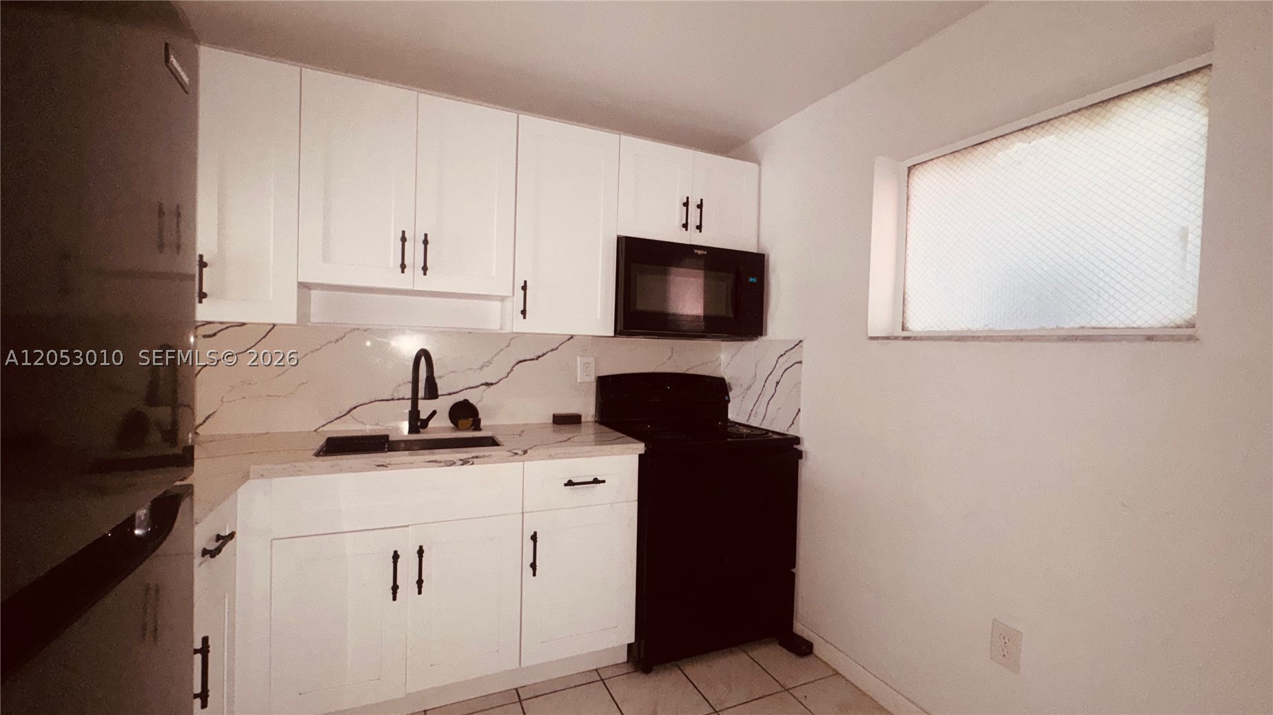 CARIBBEAN GARDENS CONDO - Residential
