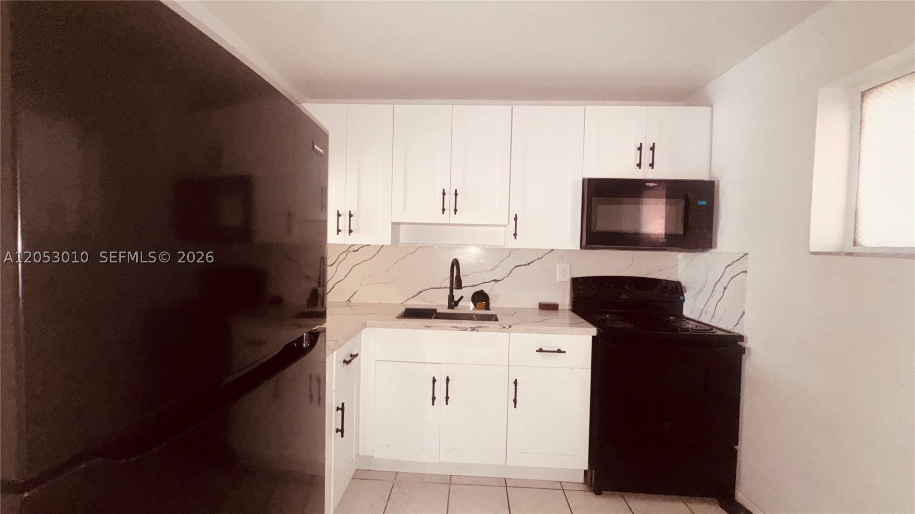 CARIBBEAN GARDENS CONDO - Residential