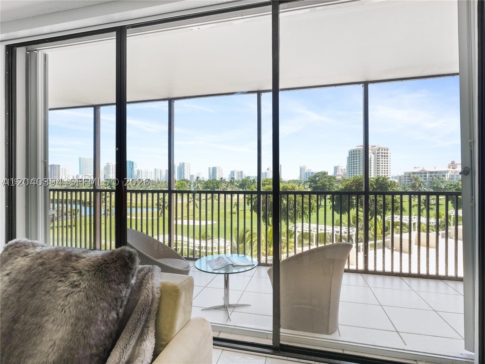 The most desirable and largest 06 line in the building, this 2 bed 2 bath condo features access to the balcony from all bedrooms and the living room. Tile floors and a split-style floor plan allow natural light throughout the unit, Walk In Closet. Spacious balcony with beautiful golf course views and hurricane shutters. Includes 1 assigned parking space in a covered garage and 1 storage unit. Just minutes to the beach, Aventura Shopping Mall, Turnberry Golf Course, Sunny Isles, US1, supermarkets, cafes and restaurants. Secured gated community with plenty of guest parking spaces. The building passed 40-year certification and features renovated halls, lobby and elevators. Amenities include fitness center, pool, sauna, jacuzzi, and 24-hour security.