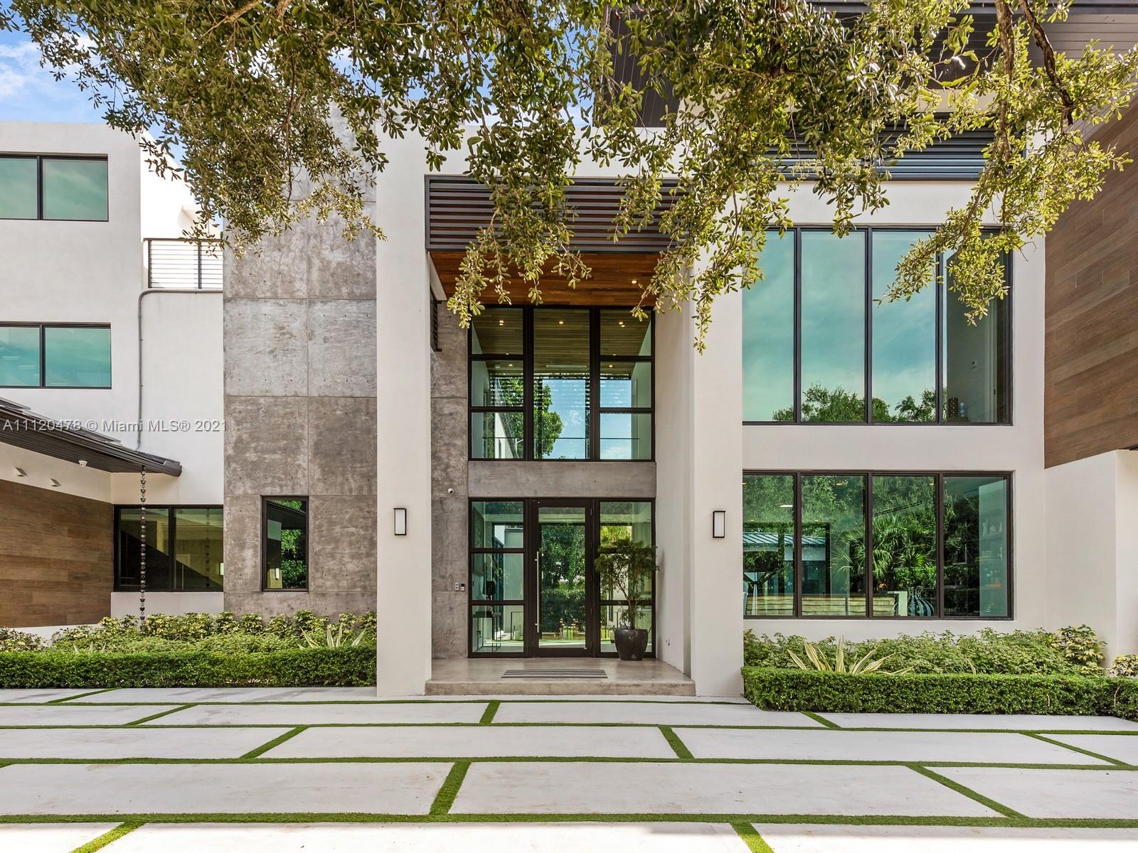 Welcome to this gorgeous fully furnished new construction home in the heart of South Miami’s High Pines neighborhood. Impeccable interiors by renowned designer Sensi Casa. This 7 | 7.5 home has it all: a spectacular entryway with a 10-ft door and 10+ft ceilings throughout the first floor; a grand, open kitchen with custom cabinetry and appliances from Mia Cucina; impeccably-designed bathrooms and custom closets; an elevator; rooftop deck with summer kitchen; smart-home technology throughout; solar panels with tesla batteries and a dedicated home gym with sauna and steam rooms. The home is centered around a resort-like pool that can be seen from almost every room in the house. Incredible spaces, design and a prime location make this an unparalleled offering.