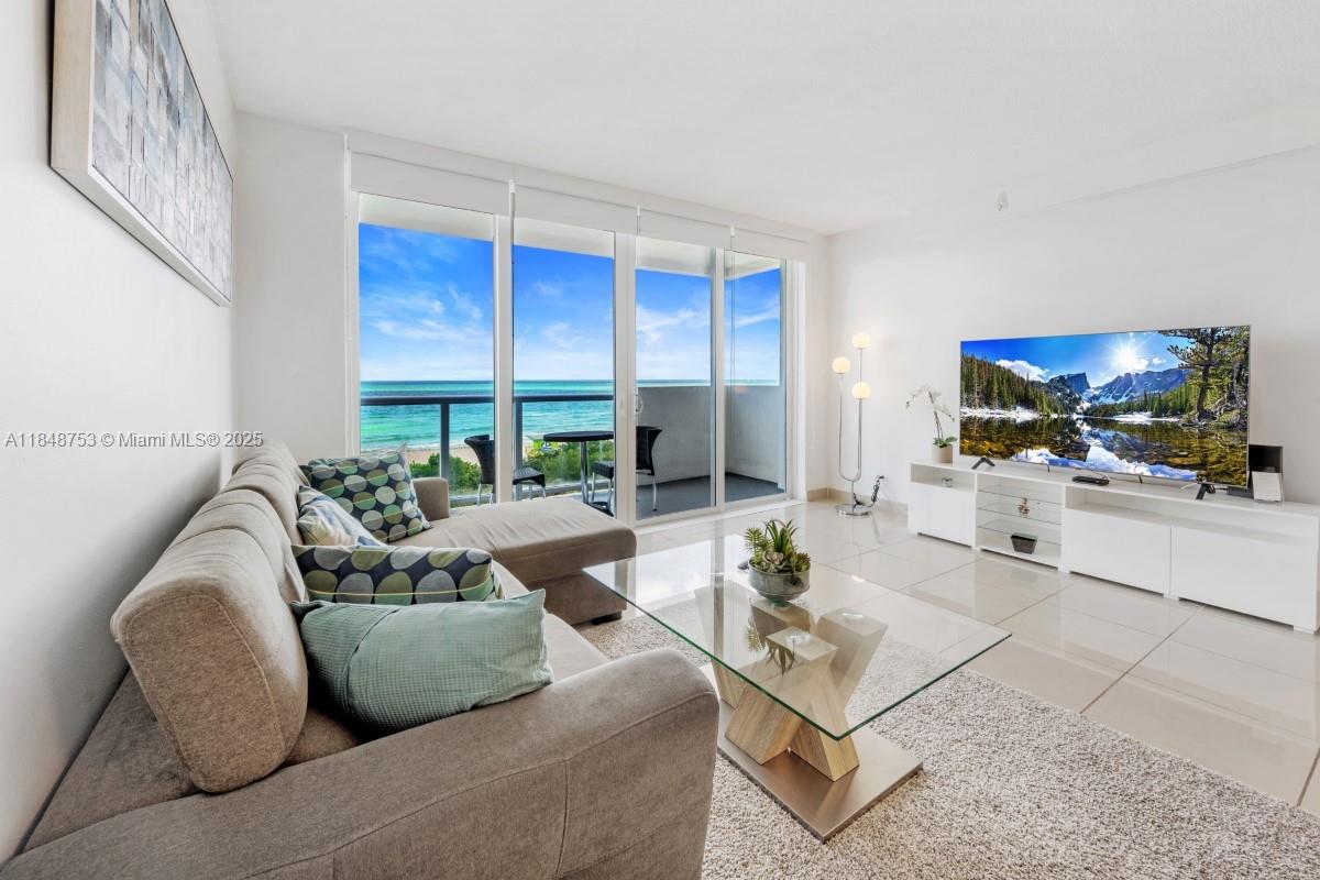 This stunning 1-bedroom, 1.5-bath condo on the 5th floor offers an unbeatable living experience with panoramic ocean views that stretch across the kitchen, living room,
and out onto the private balcony. Located in a sought-after oceanfront building, this unit combines modern comfort with the beauty of coastal living. Enjoy a suite of luxurious
amenities, including direct beach access, a sparkling pool, a fully equipped gym, 24-hour parking, on-site security, and valet service. With short-term rentals permitted, this property
presents an excellent investment opportunity. Plus, an assigned parking space adds extra convenience—something few units in the building offer. Minimum rent 6 days.
INCLUDES DESIGNATED PARKING. WASHER AND DRYER IN HALLWAY.