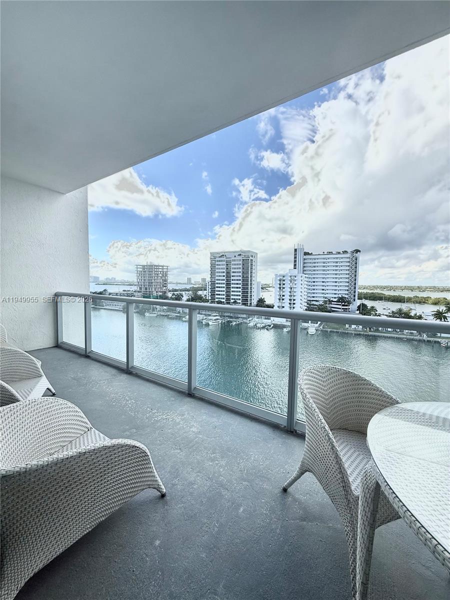 Stunning 2BR + spacious den and 3BA residence at Eloquence on the Bay with breathtaking water near.  Bright open layout with generous living areas floor plan. Resort-style amenities including bayfront pool, fitness center, tennis courts, 24/7 surveillance, valet, and marina. Prime North Bay Village location close to Miami Beach & Downtown.