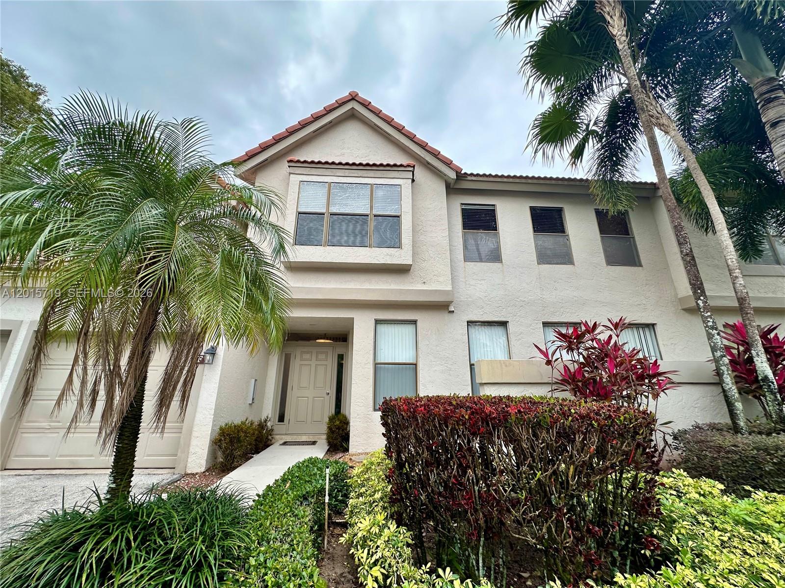 Stunning totally renovated on 2023, located on a 2nd Fl. residence situated on a tranquil and peaceful preserve setting. Gorgeous finishes include a modern contemporary open kitchen a boasting quartz center island, custom cabinets w/soft close doors/drawers, quartz countertops and new SS appliances & A/C. New electric & electric panel. Bright open living area with LED high-hats and high ceilings. High impact windows and sliding doors to an screen enclosed terrace. Beautiful updated bathrooms with white quartz top vanity, walk-in shower, seamless glass door and free standing bathtub. Includes a Car Garage. Fee includes cable, water, roof, insurance, pools & landscaping. A must see! Impecable unit, only 1 owner and used as a vacation home. Bring your pickiest clients