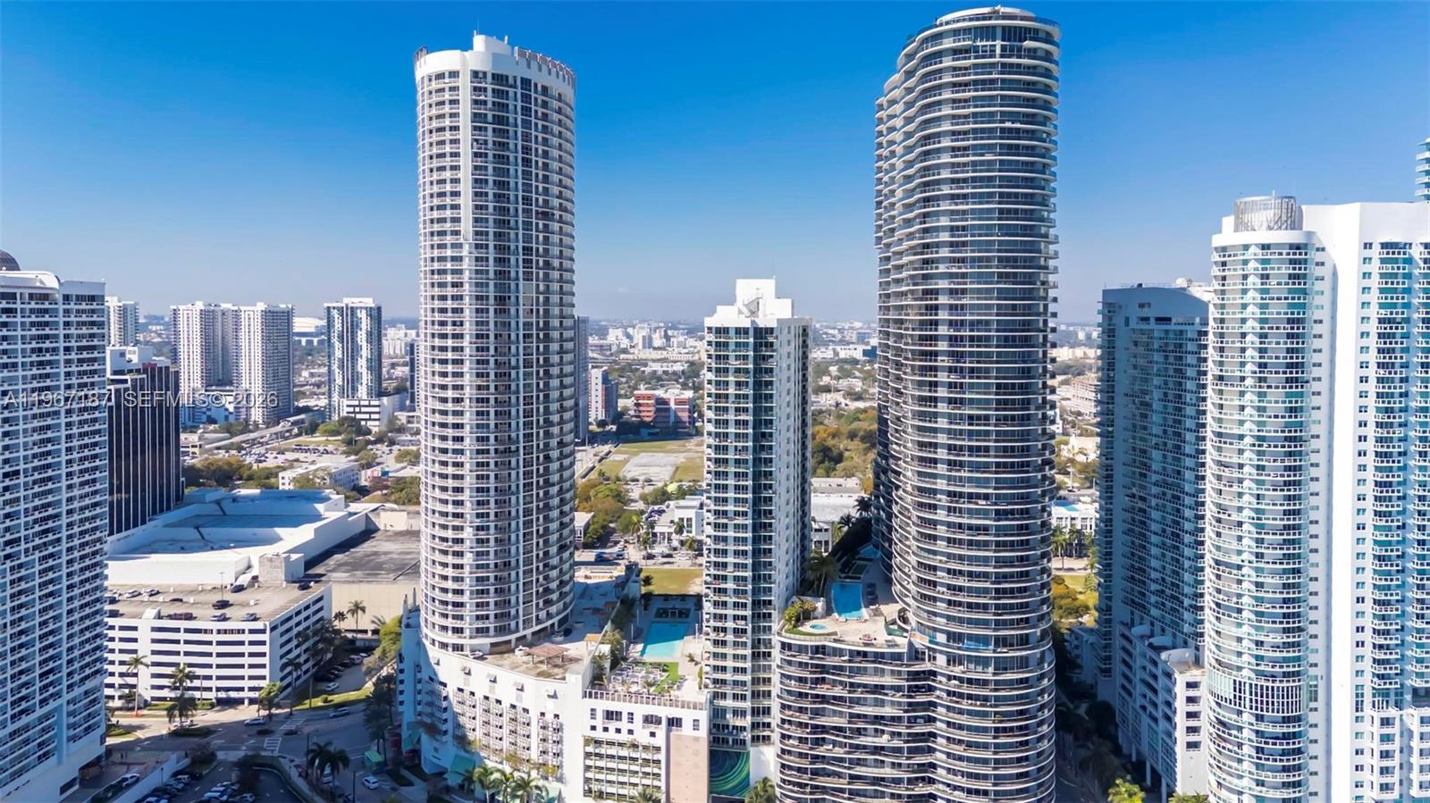 Spectacular high-floor studio residence in the iconic Opera Tower with panoramic Biscayne Bay and Miami skyline views. Bright and open floor plan features a private balcony perfect for enjoying gorgeous sunrises and city lights. Located in the heart of Edgewater directly across from Margaret Pace Park with waterfront green space, walking paths and dog park. Residents enjoy resort-style amenities including a state-of-the-art fitness center, oversized pool with whirlpool spa, and full-service lobby. Prime location minutes to Wynwood, the Design District and Adrienne Arsht Center.