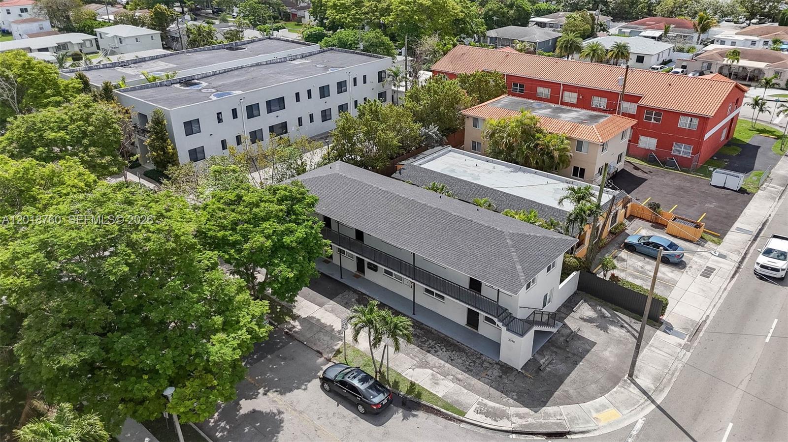 Introducing 2190 SW 14th Terrace, a fully renovated, turnkey, 100% leased 6-unit multifamily in Miami's Shenandoah corridor. The property delivers stabilized in-place income of $132,000 annually, with all leases running through mid-2027. A comprehensive 2020 renovation addressed major building components: new roof, hurricane-rated impact windows and doors, individual mini-split HVAC (central AC in one unit), new electrical, perimeter fencing, full interior gut with new tile flooring, kitchens and bathrooms, coinless laundry (owned), and tankless water heaters. Unit mix of 2 studios (approx. 450 SF) and 4 one-bed/one-bath apartments (approx. 600 SF), each with an assigned on-site parking space. Centrally positioned minutes from Brickell, the Health District, Coral Gables, Coconut Grove, and Calle Ocho. Shenandoah sits at a higher elevation than Miami's coastal submarkets, a growing consideration for lenders and insurers.