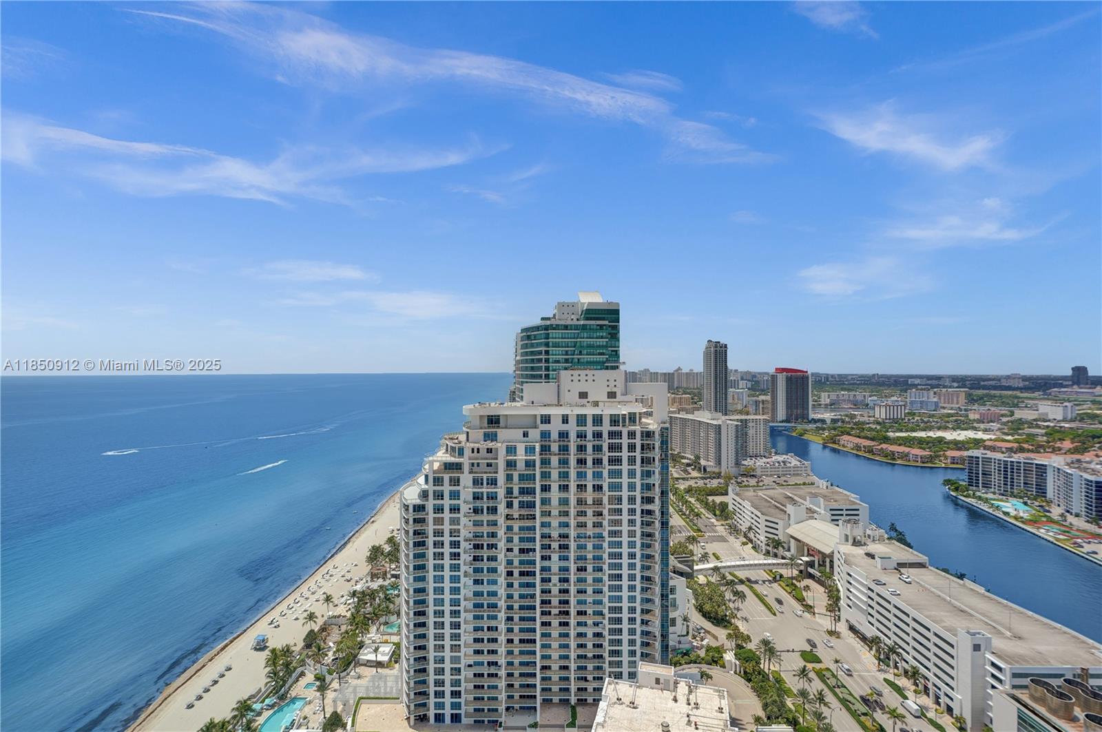 Welcome to 5-star living at Ocean Palms. Renovated 3 BD, 3.5 BA lower penthouse offers a private elevator entry into a grand double-door onyx foyer. Gorgeous panoramic ocean, Intracoastal & skyline, breathtaking views by day & beautifully lit at night from every room through floor-to-ceiling impact glass. Features:36x36 Spanish marble floors & baseboards, Venetian plaster walls, 2 terraces accessible from every rm., upgraded Italkraft kitchen w/Thermador oven & microwave, black granite countertops, Jerusalem marble backsplash, Miele & Sub-Zero appl., guest bath w/ travertine marble. Lutron smart system for lights, blinds & A/C, & high-speed wiring. Storage. Oceanfront luxury w/ valet, concierge, beach & pool svc, tennis, spa, 240 feet of pristine beachfront, 2-story gym & more. A must-see! Special Assessment has been paid in full by Seller!