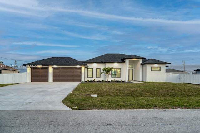 Welcome to this stunning brand new construction home situated on a rare oversized triple lot in NW Cape Coral! This modern 3-bedroom + den, 3-bath residence offers an open-concept floor plan with soaring ceilings, elegant tray ceiling details, and stylish finishes throughout. The spacious kitchen features ample cabinetry and flows seamlessly into the bright great room—perfect for entertaining.

The primary suite is a true retreat with dual sinks, a spa-like bathroom featuring a separate soaking tub, and a large walk-in shower. Enjoy Florida living year-round on the covered lanai overlooking the fully fenced backyard with plenty of room for a pool. Additional highlights include impact windows and doors, a 3-car attached garage, and a versatile den ideal for a home office or guest space. Located in a growing area of NW Cape Coral with city assessments ALMOST paid off and no flood insurance required. Seller is motivated, bring all offers! Conveniently close to shopping, dining, and major roadways. Don’t miss your opportunity to own a beautiful new home with space, comfort, and modern design!