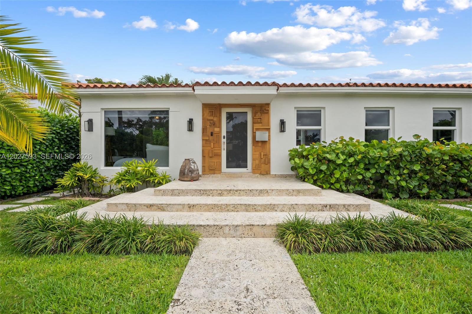 Welcome to this dreamy Spanish bungalow in the heart of Coral Gables, ideally located just off Ponce de Leon and within walking distance of the very best the Gables has to offer. Meticulously restored and thoughtfully upgraded by its current owners, this charming residence perfectly blends timeless character with modern convenience.
The home features 2 bedrooms plus a versatile third room currently used as a home office, along with 2 beautifully appointed full bathrooms. Every detail has been carefully considered to create an effortless living experience, from the functional layout to the stylish finishes throughout. Hardwood floors throughout entire floorplan are original to the property and have been beautifully restored. 
Step outside to enjoy a private outdoor oasis complete with patio, outdoor kitchen, and additional storage room—perfect for entertaining or relaxing year-round. The spacious backyard is free of large trees but surrounded by a privacy hedge, offering endless potential for a future pool and possible expansion of the property. NOT ON SEPTIC TANK, side yard has room for boat storage. Situated on a quiet, historic Gables street with ample off-street parking for residents and guests, this home is truly a rare find. A property that must be seen in person to fully appreciate its charm, warmth, and exceptional attention to detail. Please review broker remarks.