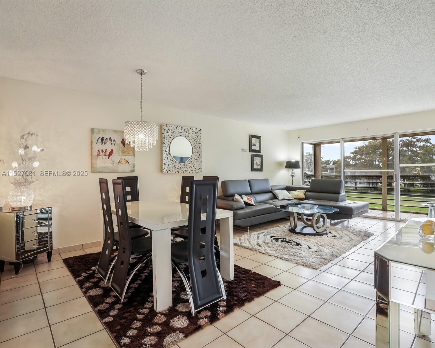 Welcome to a bright, spacious corner unit in the heart of Tamarac!
This beautifully updated 2-bed, 2-bath condo offers comfort, convenience, and resort-style living in the desirable Sands Point community. The open layout is filled with natural light, featuring a generous living/dining area perfect for relaxing or entertaining. The modern kitchen comes equipped with ample storage and counter space.

Enjoy a large primary suite with a walk-in closet and a well-appointed private bath. The second bedroom is ideal for guests, a home office, or seasonal living. Step onto the screened balcony to unwind with peaceful views of the golf course and community grounds — the perfect spot for your morning coffee.

Sands Point is a well-maintained, amenity-rich community offering a pool, clubhouse, exercise room, tennis, and walking paths. Located minutes from shopping, restaurants, parks, and major highways, this unit is ideal as a full-time residence, vacation home, or investment property.

Move-in ready and easy to show — don’t miss this opportunity!