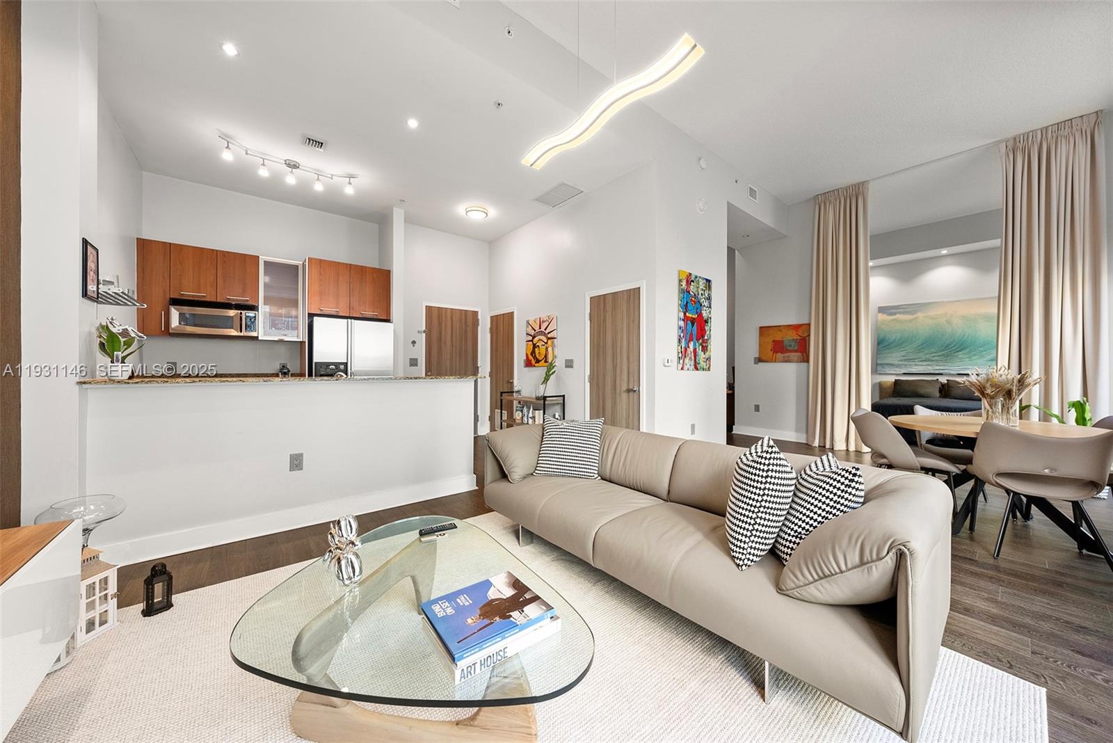 BEAUTIFUL MODERN LOFT FOR SALE AT METROPOLIS II AT DADELAND! THE BUILDING IS LOCATED IN DOWNTOWN DADELAND. 1 BEDROOM PLUS DEN AND 1 BATHROOM WITH 890 SQFT. OPEN AND BRIGHT UNIT. 13’ HIGH CEILINGS WITH MOTORIZED BLINDS, WALKING CLOSET, WASHER AND DRYER INSIDE THE UNIT, FULL BATH, TILE FLOORS THROUGHOUT. ONE PARKING SPACE ASSIGNED ON THE SAME FLOOR OF THE UNIT PLUS VALET PARKING. GREAT AMENITIES: 2 POOLS, JACUZZI, SAUNA, LOUNGE ROOM, GYM, ON-SITE MANAGEMENT, LOBBY WITH 24 HOURS CONCIERGE. FANTASTIC LOCATION! WALKING DISTANCE TO DADELAND MALL, METRO STATION AND RESTAURANTS!