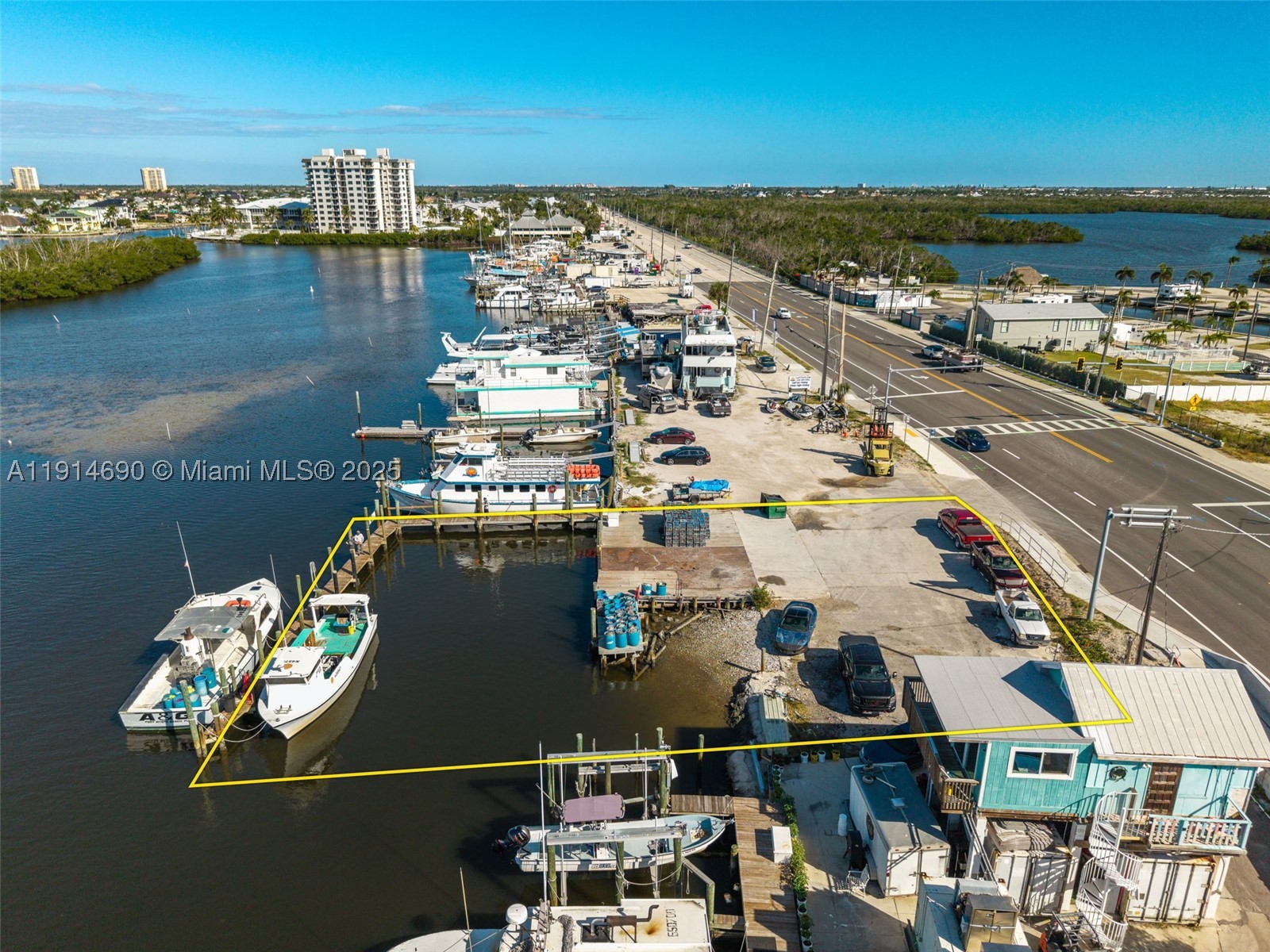 Prime Bayfront Commercial Property – Minutes from Fort Myers Beach! Located on San Carlos Blvd, just one mile from downtown Fort Myers Beach, this waterfront commercial parcel offers direct Gulf access and endless potential. Surrounded by successful marine and tourism businesses—fishing charters, boat rentals, parasailing, tiki tours—this site ensures high visibility and synergy. Within walking distance to restaurants and bars, with owned submerged land and a large dock ready for immediate use, it’s ideal for marine, hospitality, or eco-tourism ventures. Rare investment in a thriving coastal corridor.