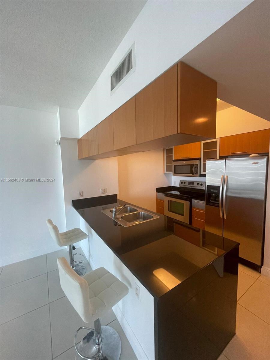 OPERA TOWER CONDO - Residential Lease