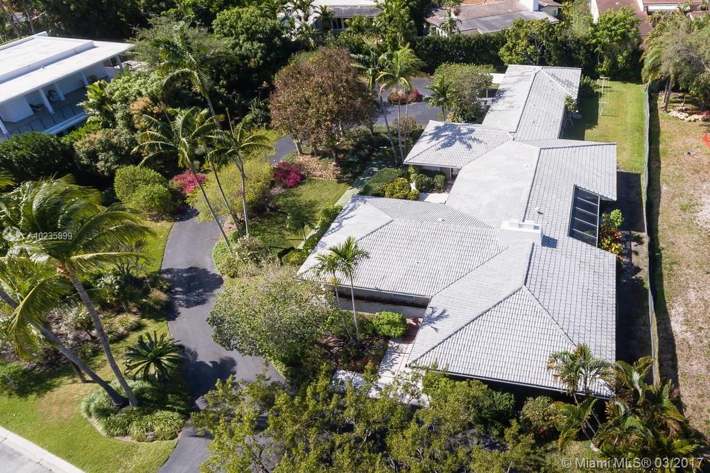 Exquisite Bal Harbor Village home on 31,000 square-foot lovely landscaped estate. In gated desirable neighborhood this elegant 4 bedroom 4 & 1/2 bathroom home has been updated w/new roof, new central AC system, new electrical wiring & new kitchen w/granite countertops, Viking, Miele & subzero appliances. Featuring spacious floorplan w/marble floors, high ceilings, 2 patios, 2 car garage & carport. Amazing investment potential as well: should be possible to split lot into two & build a second home.