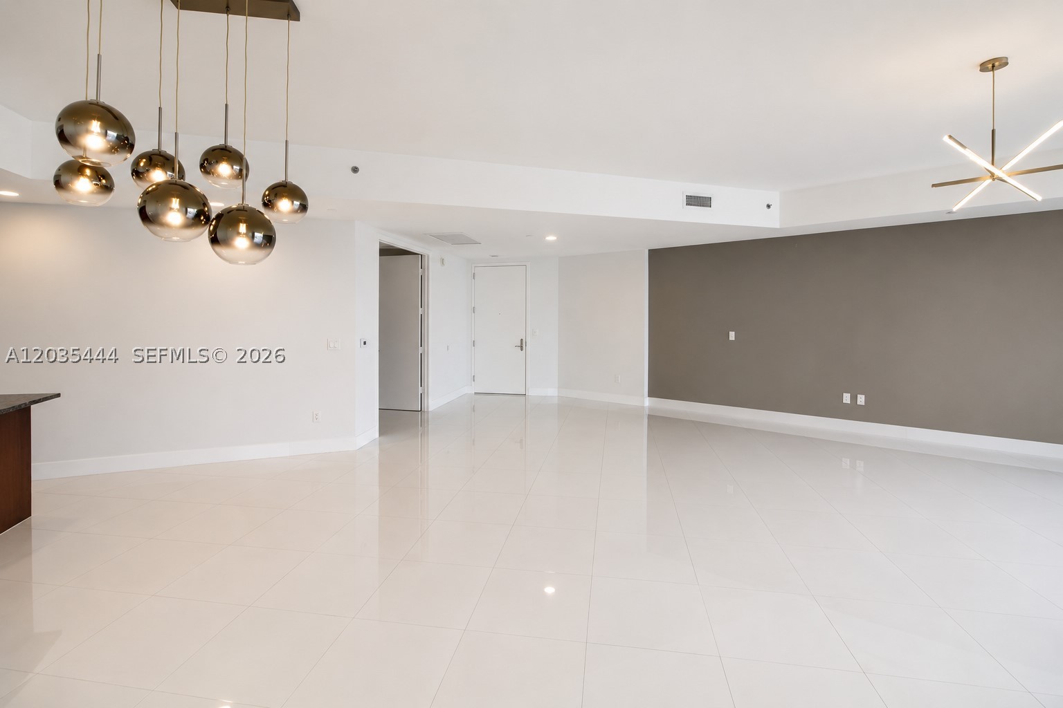 Welcome to Trump Towers Sunny Isles Beach, where style meets the ultimate beachfront lifestyle. This spacious, unfurnished 2-bedroom, 2-bathroom residence features porcelain floors, floor-to-ceiling windows, and stunning ocean views. With the pool right next to the patio, it feels like a true beach home. Move-in ready, the condo offers resort-style amenities such as a state-of-the-art gym with ocean views, sauna, spa, heated pool, jacuzzi, clubroom, kids’ room, billiards, business center, on-site restaurant, and full beach service with towels, chairs, and umbrellas. Enjoy 24-hour concierge, complimentary valet, and top-level security, all just minutes from Bal Harbour Shops, Aventura Mall, fine dining, and major airports