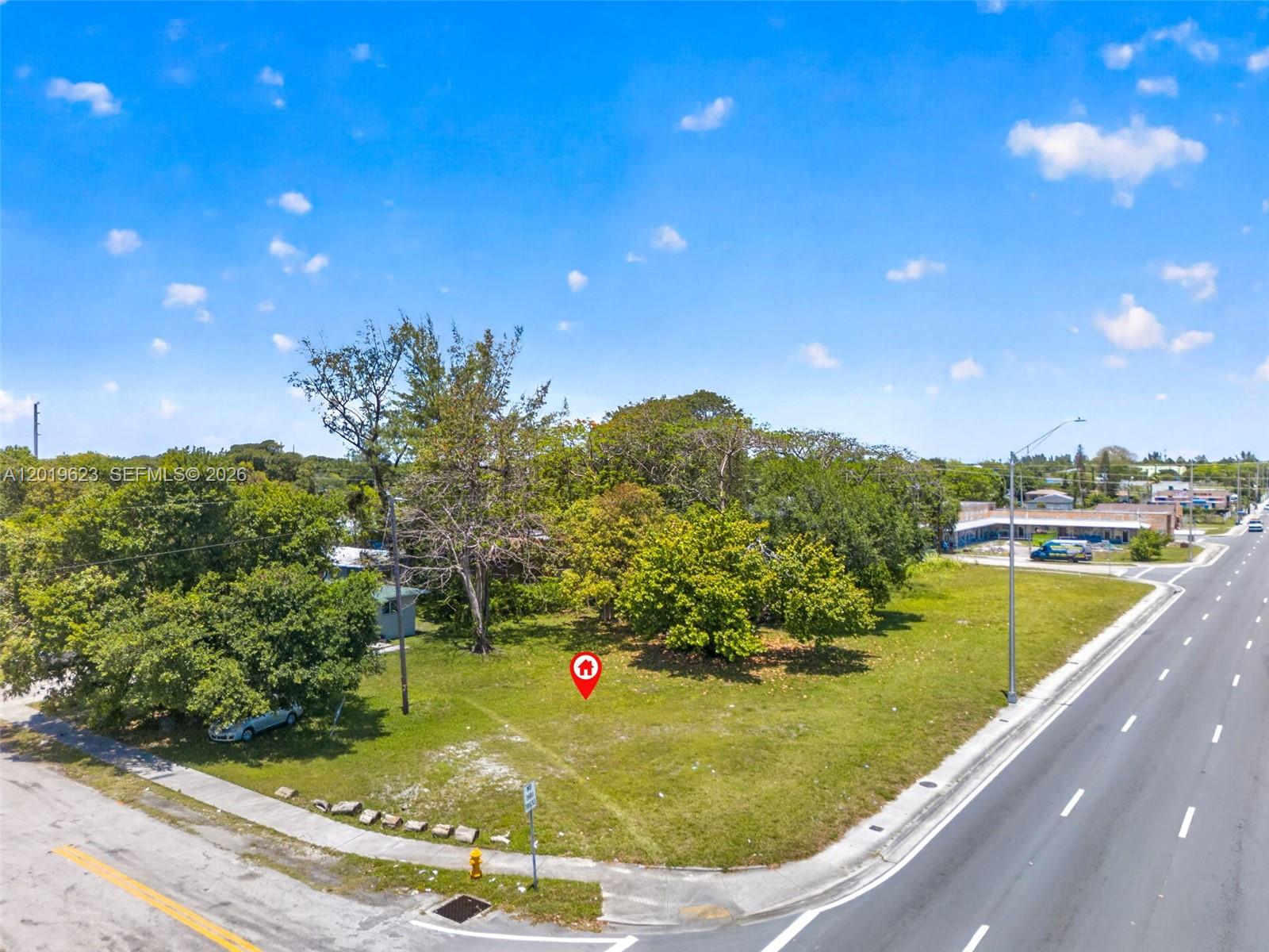 Great investment opportunity to own vacant land  in a highly visibility location.  This prime corner lot offers excellent exposure and is ready for development, making it an ideal location for a great business venture.  Property has easy access to the main highways, airports, shops, schools and other business.  Come see this prime location on the corner of NW 63rd Street, and 22nd Avenue, Hurry!!