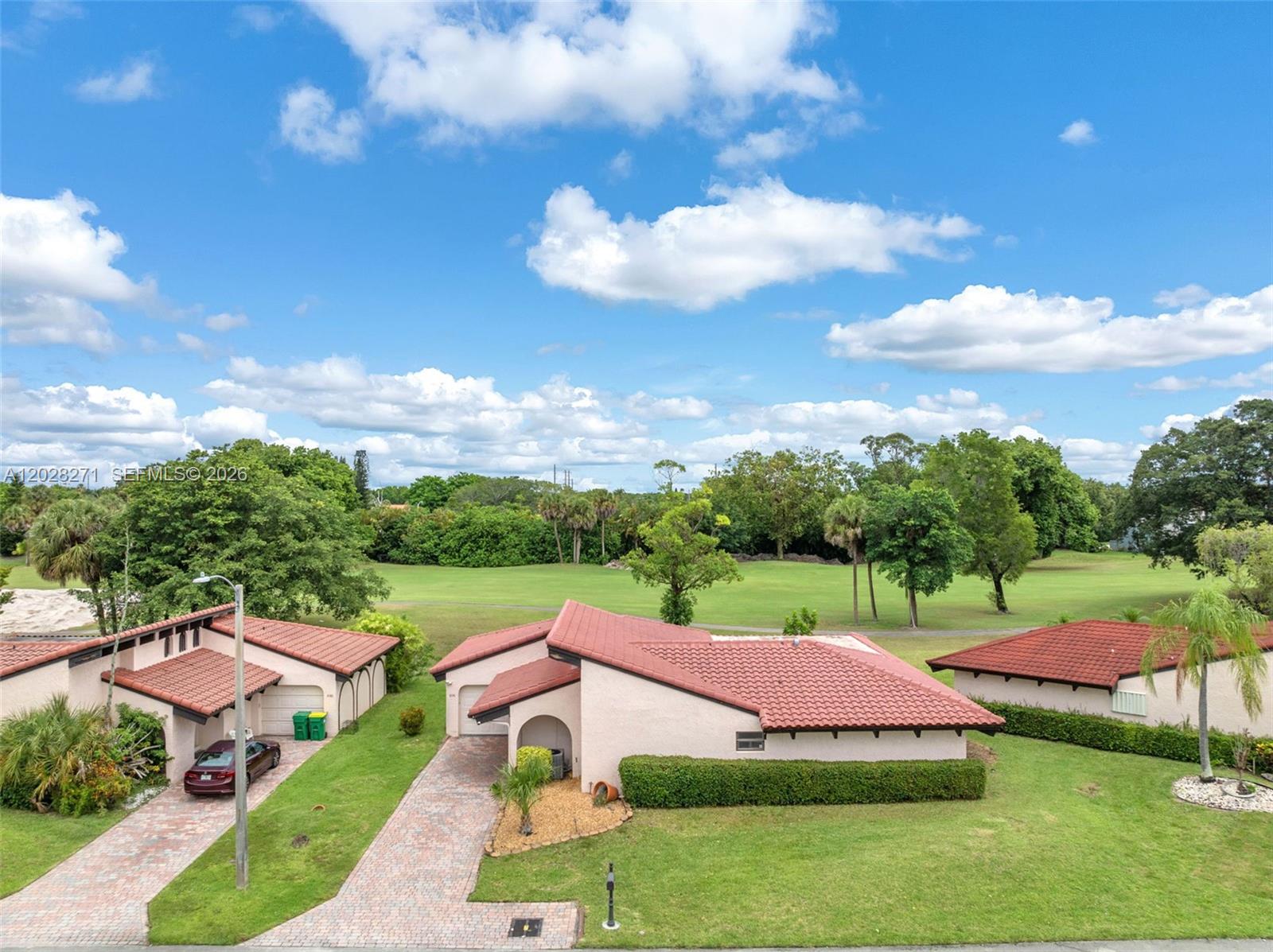Beautiful and spacious 3-bedroom, 2-bathroom detached villa in the heart of the highly sought-after Woodmont Country Club community! Boasting over 2,200 square feet of living space, this single-story home features an open and airy floor plan. The updated kitchen shines with all-wood cabinetry, a large center island, stainless steel appliances, and beautiful quartz countertops. Soaring vaulted ceilings and elegant clerestory windows flood the home with natural light, leading into an expansive 20x20 family room—perfect for entertaining while enjoying unobstructed golf course views! With thoughtful updates throughout, this property provides a solid foundation while offering the perfect canvas for personal touches. Conveniently located near major highways, shopping plazas, schools, and dining—come make this house home!