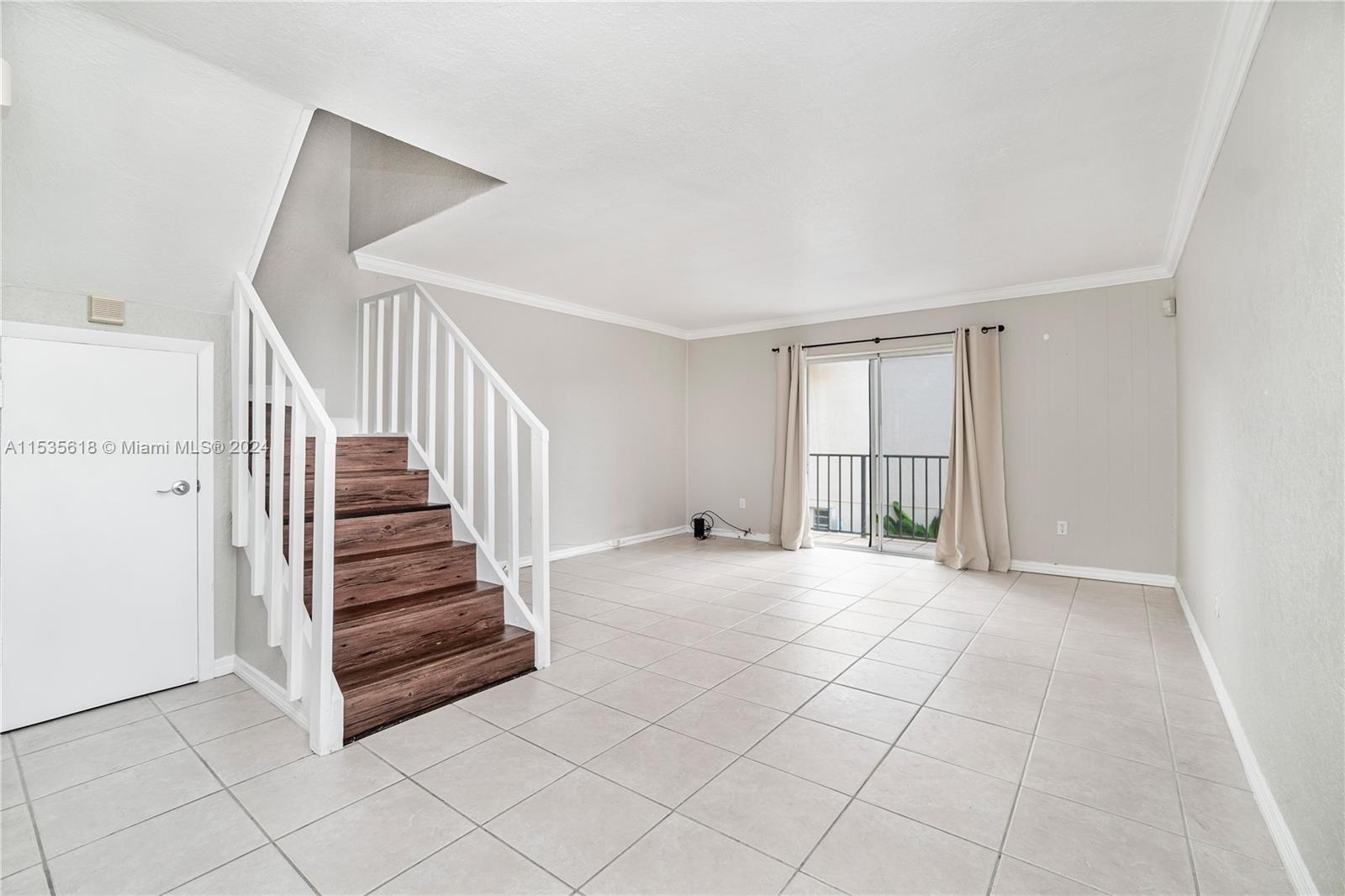 This move-in-ready corner townhouse on the second floor offers convenience and comfort. Located in the Pinecrest Schools district, this gated complex is minutes away from top schools, US 1, shopping, and dining. The first floor features tile flooring, while wood floors adorn the stairs and both bedrooms on the second floor, each with its own bathroom—one with a shower, the other with a tub and shower combination. The kitchen boasts a gas stove, and the unit includes a washer/dryer. A half bathroom downstairs adds convenience. Sliding glass doors open to a balcony in this tranquil complex with accordion hurricane shutters. Pets are welcomed.