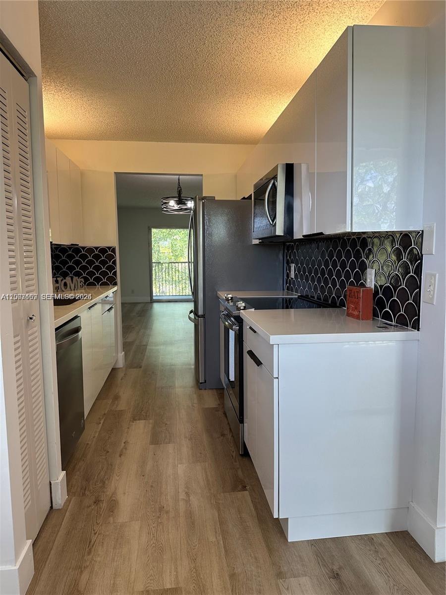 CAMBRIDGE AT CENTURY VILL - Residential