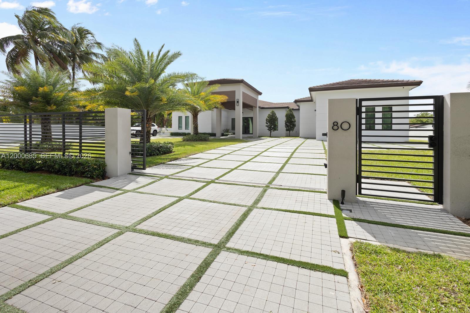 A modern masterpiece which sits on 1 acre featuring six spacious bedrooms each with their own in suite bathroom, including a luxurious primary with walk in closets and spa like bath. Designer finishes, top tier appliances, butler's pantry and private theatre. The home boasts soaring high 12-inch ceilings, sleek modern decor and an abundance of natural light and open living spaces. Over $500K in upgrades with uncompromising attention to detail. Outside there's a generous backyard resort style with a stunning pool, large spa, covered lounge, NBA style half basketball court, pickleball court, and not to forget its own private 1 bedroom 1 bathroom guest house.