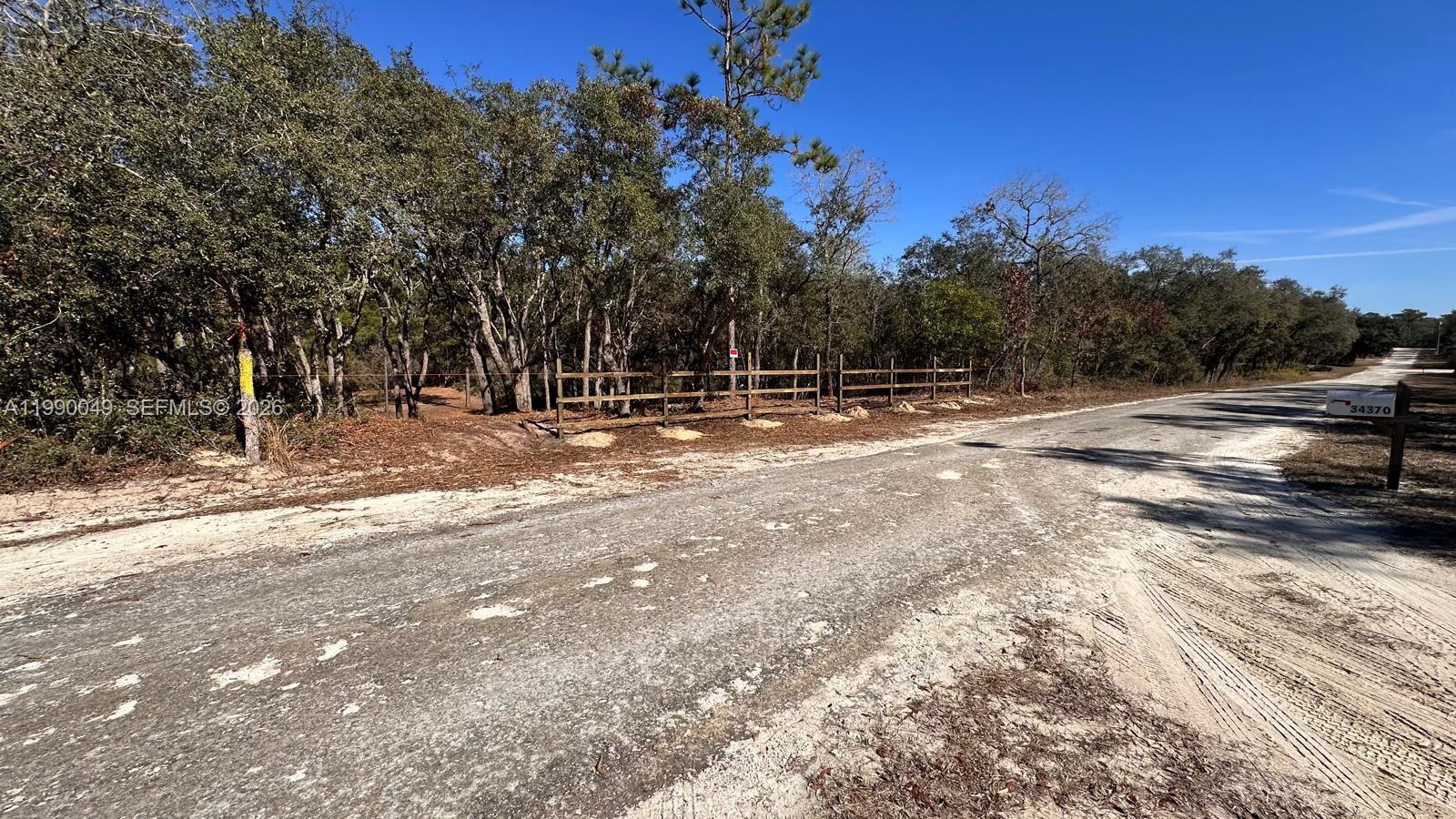 Prime 0.5-Acre Residential Lot in Ridge Manor Estates – No HOA! Discover the perfect location to build your dream home, This beautiful flat lot spans 0.5 acres and is zoned R1C, offering endless possibilities for a single-family residence. Conveniently situated near Highway 301, this peaceful property provides easy access to Webster, Dade City, Brooksville. Enjoy the best of Florida’s Nature Coast with the Withlacoochee River and Withlacoochee State Forest just a short drive away. Whether you love fishing, kayaking, hiking, camping, or off-road adventures, this area has something for everyone! Explore nearby SUV trails, ATV trails, horse trails, and bike trails for year-round outdoor recreation.