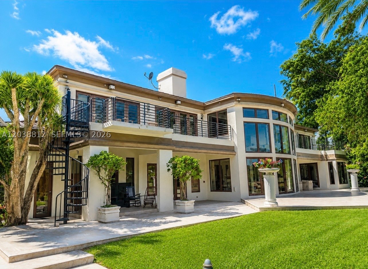 Nestled on a spectacular 1.51-acre estate lot in the heart of Pinecrest, this exceptional residence offers over 10,600 SF of living space designed for grand-scale entertaining and comfortable family living. The resort-style backyard features a stunning 30’ x 60’ pool, expansive outdoor areas, and lush tropical landscaping, creating a private oasis. With spacious living areas, generous bedrooms, and timeless architectural details, this property presents a rare opportunity to own one of Pinecrest’s premier estate homes.

Photos have been enhance.
