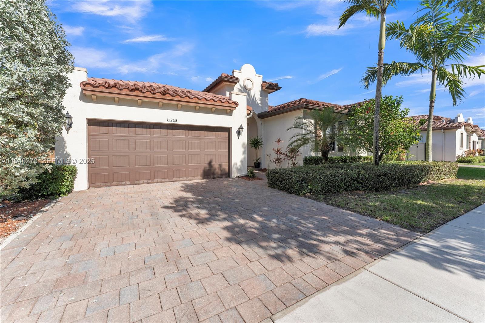 Beautiful 4-bedroom, 3-bath residence located in the sought-after Venetian Parc community. The interior features Brazilian oak wood flooring throughout the main living areas and a bright, open layout ideal for both everyday living and entertaining. The kitchen is finished with quartz countertops and stainless steel appliances, offering both style and functionality. Major improvements include a new AC system installed in 2024 and a brand-new tankless water heater in 2025. Situated on an oversized 7,500-square-foot lot, the home offers a private pool surrounded by attractive landscaping, creating a welcoming outdoor space. A double-door side fence provides convenient access to bring in and park a boat or other recreational vehicles, and the pool motor was replaced in 2025 for added peace of mind. Venetian Parc offers desirable amenities including an infinity pool, barbecue area, children’s playground, fitness room, and clubhouse, with convenient access to schools, shopping, dining, and major roadways.