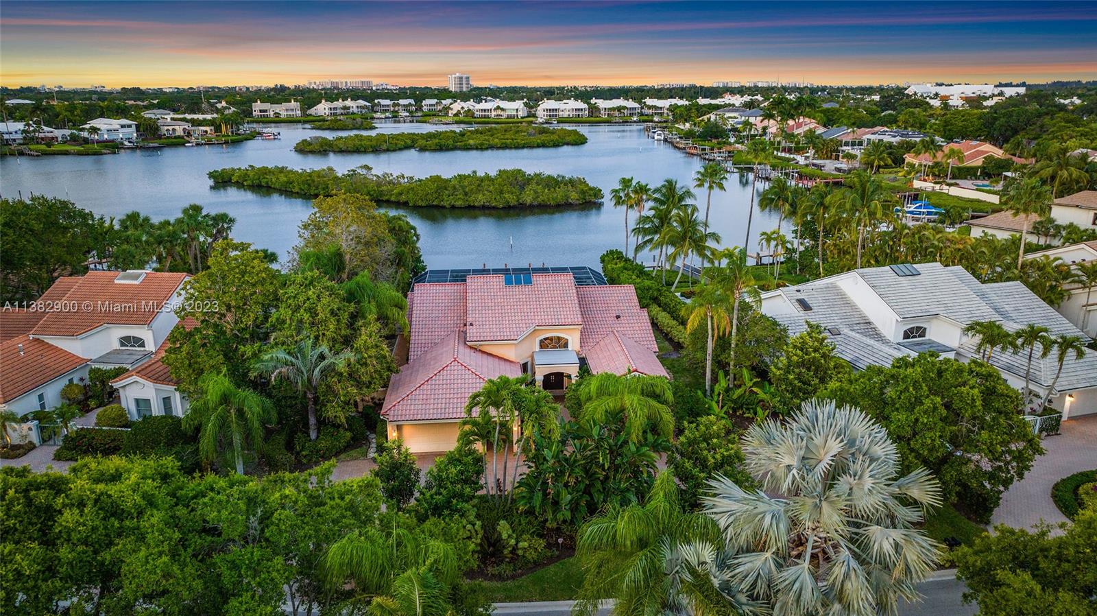 Location Location Location, Rare opportunity Social Membership - Wide and vast panoramic views that will not disappoint. Enjoy specular sunrises over looking the wide navigable waterway, interior island with tons of wildlife all from your private residence. This property sits high with retaining walls, perfect for a new build or a remodel with both water and golf views. Large great room concept with 3 bedrooms, glassed in sunroom, large pool, tons of storage, kitchen that opens to side patio and much much more. 2.5 car garage