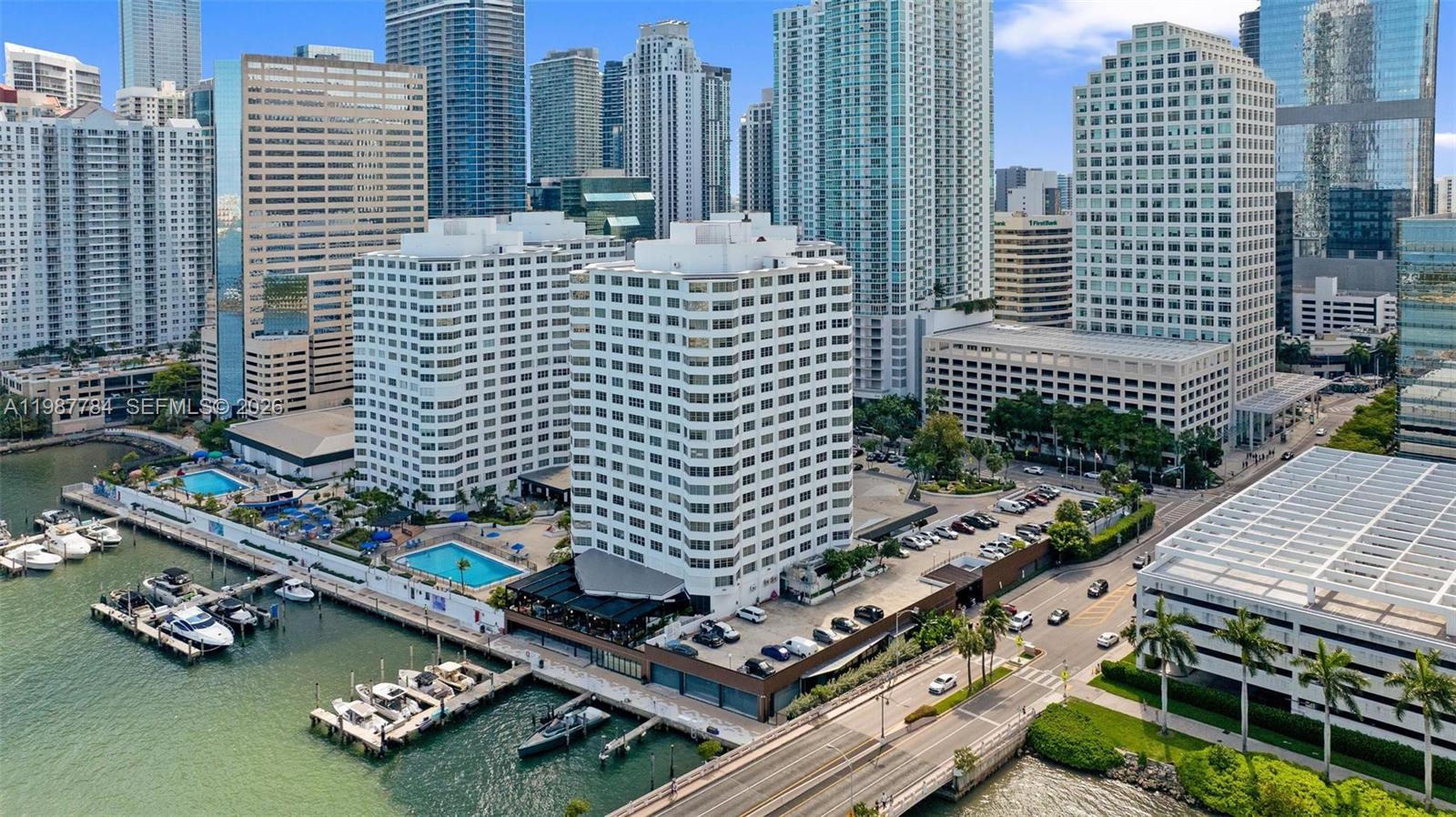 A great opportunity awaits at the iconic Four Ambassadors, it is ideal for both investors and owner-occupants. Priced as the best value on Brickell Avenue, it's located in the heart of Brickell, truly at the center of it all. Residents enjoy an impressive array of on-site amenities, including the renowned Delilah Las Vegas Club & Restaurant, a poolside bar, grocery and deli, bakery, Flamingo Theater, beauty salon, massage services, fitness center, dry cleaning/laundry facilities, and two Olympic-size swimming pools. Step outside and you're within walking distance of Miami's top dining destinations, right on Brickell. Life here flows effortlessly with waterfront pools, on-site dining, a marina, and the best of Brickell just outside your door. Whether you're starting your day with a stroll along the bay or dining out steps from home, every moment feels like a vacation