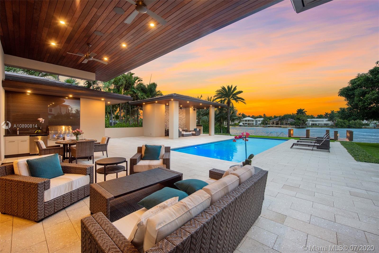 2018 one-story waterfront home, elegantly appointed with state-of-the-art finishes the residence captures the essence of South Florida’s waterfront lifestyle.  Home offers large sunlit and inviting living spaces complemented by hardwood flooring and moveable walls of glass that seamlessly transition from interior to exterior living spaces.  The impressive kitchen features a large center island, walk-in pantry and bar seating area.  Meticulous attention to detail is evident throughout the home.  Owner’s suite features a spa-inspired bath and dual custom walk-in closets.  Outdoors, a remarkable pool, covered terrace, summer kitchen, yacht dockage and wide-open water views offer endless options for entertaining.