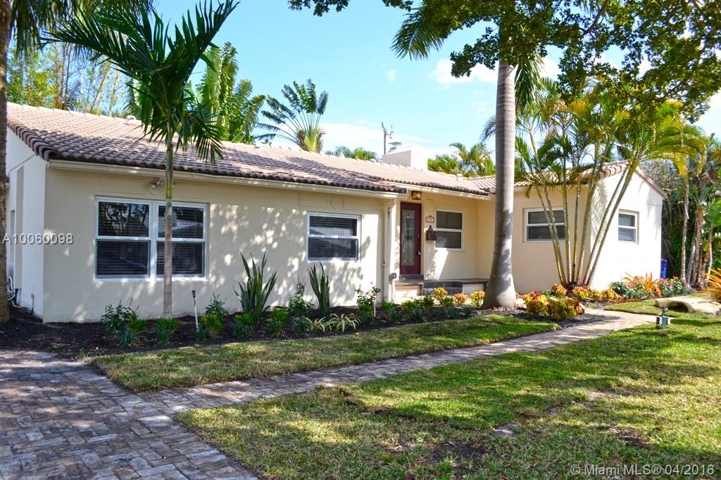 This charming 4 bedroom home has been updated and decorated as a Beach Home.  Move in or rental ready.  Furniture will convey with property for an additional charge.  Brand new Kitchen with Quartz Counters give a modern feel while the hardwood & Travertine floors and Lime Stone Fireplace give the home some Old World Charm.  This is an oversized lot with a beautiful pool on a quiet street.  Minutes from the ocean, shopping and night life.