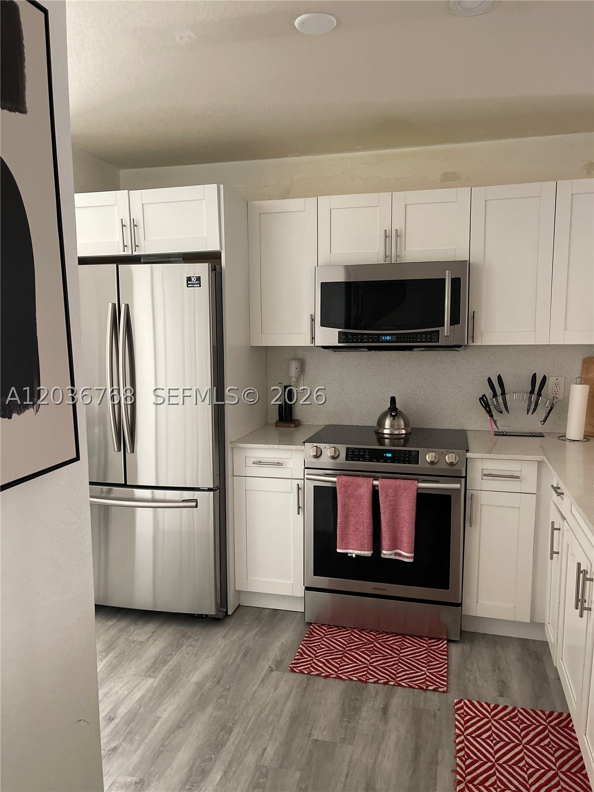 Welcome to this beautiful 2 bedroom, 2.5 bathroom townhouse located in the vibrant, urban-style community of Mirabella. Enjoy the convenience of a walkable neighborhood, low monthly HOA fees, and no rental restrictions. This corner unit offers an upgraded kitchen, elegant laminate and tile flooring, and a spacious living area perfect for relaxing or entertaining. The charming breakfast nook provides a perfect spot for your morning coffee. Whether you're a first-time homebuyer or investor, this well maintained townhouse offers comfort, convenience, and affordability in one of Miramar's most desirable locations. City of Miramar is currently offering down payment assistance for first time home buyers. Don't miss the opportunity to make this beautiful townhouse your new home.