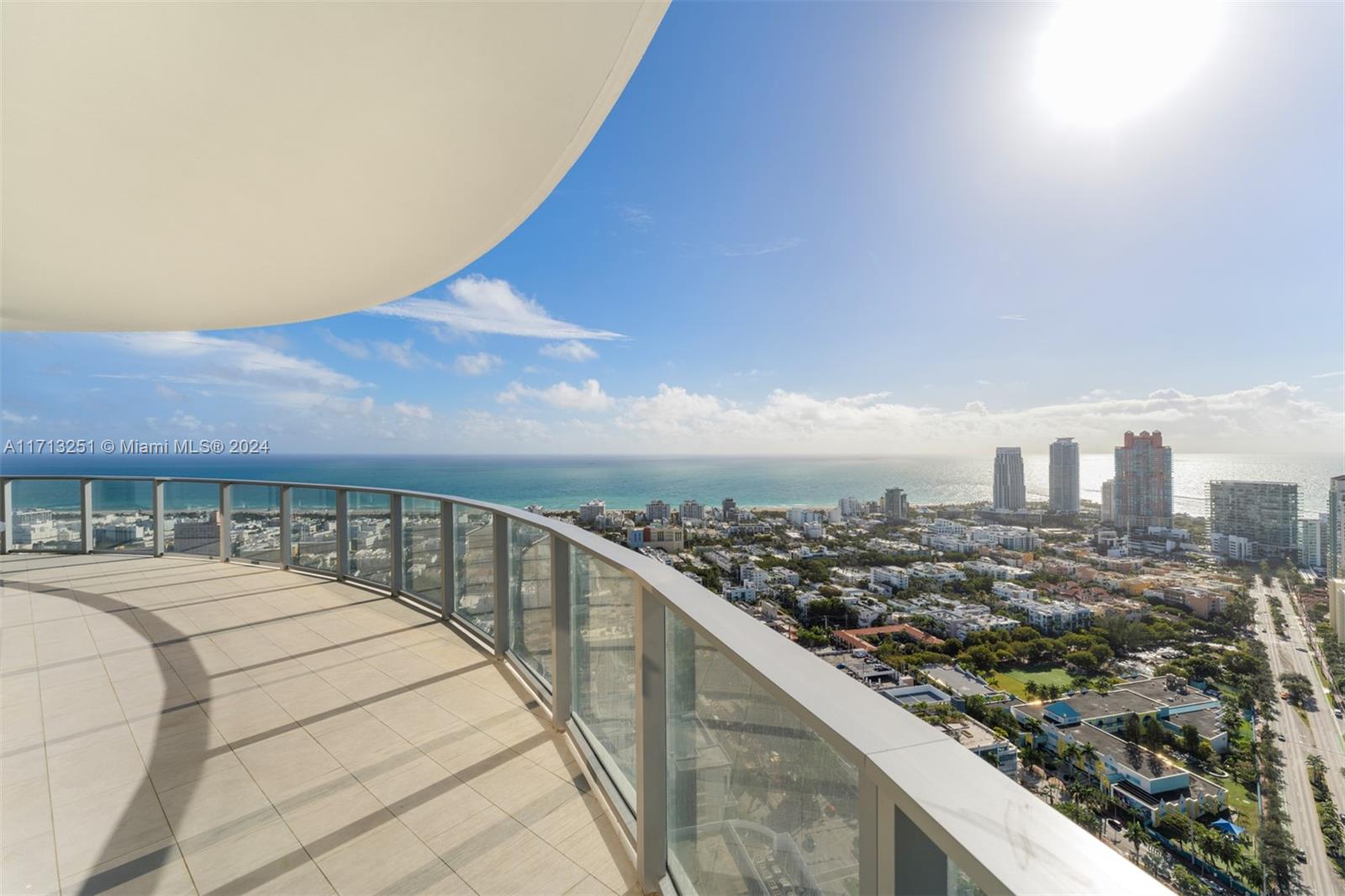 Discover luxury redefined at Five Park, South of Fifth’s newest masterpiece by Arquitectonica. This exclusive, never-lived-in corner residence, located on the premier 01 line, offers 4 bedrooms, 4 + 1 bathrooms, and 3,186 SF of elegant living space. The open floorplan features 10-foot floor-to-ceiling windows, showcasing stunning ocean, bay and city views. Custom-designed kitchen complete with Italian oak cabinetry, marble countertops, and Gaggenau appliances.The primary suite boasts breathtaking ocean views, with abundant natural light, and a spacious walk-in closet.The amenities include beach club access, Canopy Park, Fitness Center, Wellness Spa, Rooftop Pools, Kid’s Room, Private Offices & Restaurant.Located in the Heart of South Beach with World Class Dining, Beaches & Downtown Miami.