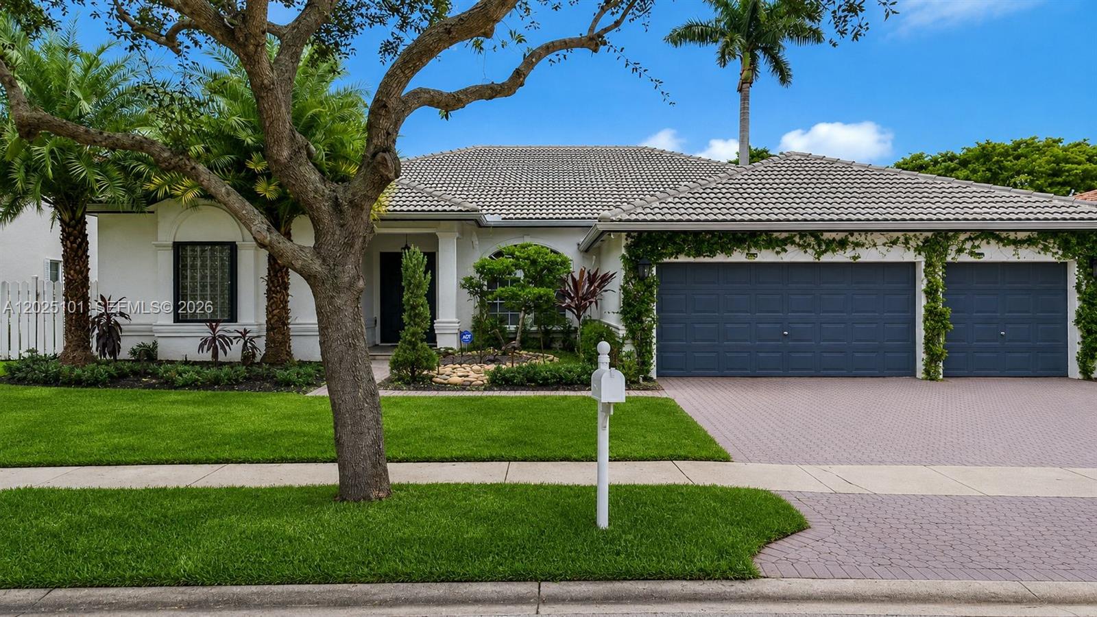 Welcome to your dream home in the gated community of Windsor Palms! This stunning 4-bedroom + flex space home offers 3 full bathrooms, a 3-car garage, and the ultimate South Florida outdoor lifestyle. Ideally located with easy access to I-75, this home combines space, style, and convenience. Inside, you’ll find spacious living areas with all-new laminate flooring and a bright open-concept layout. The modern kitchen features quartz countertops and plenty of room for entertaining. The oversized primary suite is a true retreat with an extra flex space perfect for an office, nursery, gym, or sitting area. Enjoy two large custom walk-in closets with built-ins and a massive spa-like primary bathroom designed perfectly for a party of two. Step outside to your private fenced backyard oasis complete with a sparkling pool with a new salt water system, pergola-covered outdoor kitchen, low-maintenance turf grass, and plenty of space to relax or entertain year-round. 2021 ROOF!!