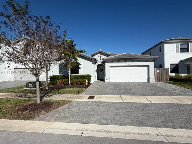 PERFECT HOUSE FOR A BIG FAMILY,  3/3 - 2 CG,  TILE THRU OUT, BARREL ROOF, INCLUDES, HURRICAINE PANELS, TERRACE, AND ALUMINIUM ROOF, FENCE, AND PAVERS IN THE DRIVEWAY  AND IN THE BACK PATIO. MOTIVATED SELLER!       JUST REDUCED FOR A FAST SALE !