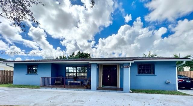 Home features 5 bedroom 3 bath, 3/2 in main property and a 2/1 with a seprate entrance. Can easily be converted to a 5/3. Tile and wood floors, Main room with walk in closet and custom cabinets. Good size kitchen with granite counter tops. Roof is 5 years old. Fruit trees in the backyard. And so much more.
