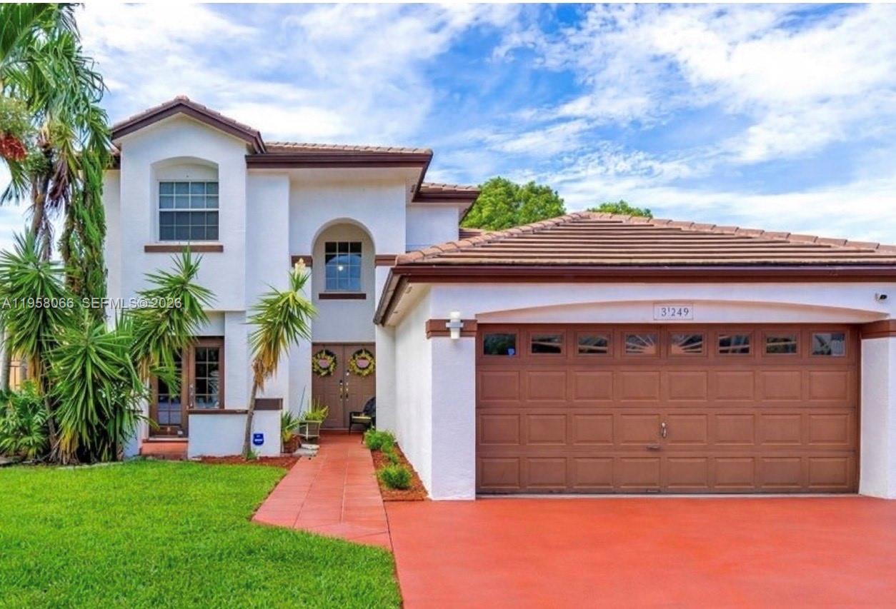 ZERO CLOSING COSTS FOR QUALIFIED BUYERS. Experience refined Miami living in this beautifully appointed 4-bedroom, 3-bathroom residence - currently being used as a 3/3 - spacious 2-car garage, NEWER ROOF, FULLY REPLACED MAY 2020. This property is perfectly situated in the heart of Westchester. This thoughtfully designed home offers an elegant blend of comfort, space, and versatility, featuring a private downstairs bedroom with full bath and separate entrance—ideal for guests, multigenerational living, or a home office suite. The main living areas are filled with natural light and designed for effortless entertaining. A stylish open-concept kitchen with a breakfast nook flows seamlessly into the living and dining spaces, creating a warm yet sophisticated setting for gatherings. Upstairs, spacious bedrooms provide privacy and comfort, including a serene primary suite designed as a true retreat. Enjoy a prime location just minutes from FIU, Belen Jesuit Preparatory School, Christopher Columbus High School, premier shopping, dining, and easy access to Doral and major expressways. A rare opportunity in today’s market—NO HOA, offering complete freedom and long-term value. This is luxury, location, and lifestyle all in one exceptional home.