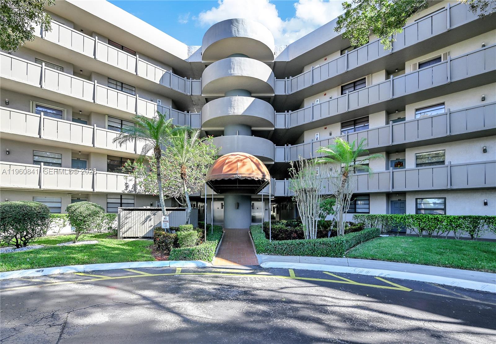 Resort-style living awaits in this beautifully maintained and thoughtfully updated condo located in a desirable 55+ community. The renovated kitchen features modern appliances, and the convenience of an in-unit washer and dryer adds everyday ease. Enjoy serene lake views from the private balcony—perfect for peaceful mornings and relaxing evenings. The front of the unit also offers picturesque views of the lake, pool, and clubhouse. The community is surrounded by lush landscaping and tranquil water features, while remaining ideally located within walking distance to shopping, dining, and medical facilities. Additional amenities include a community bus service and priority power restoration during storms due to proximity to essential services.